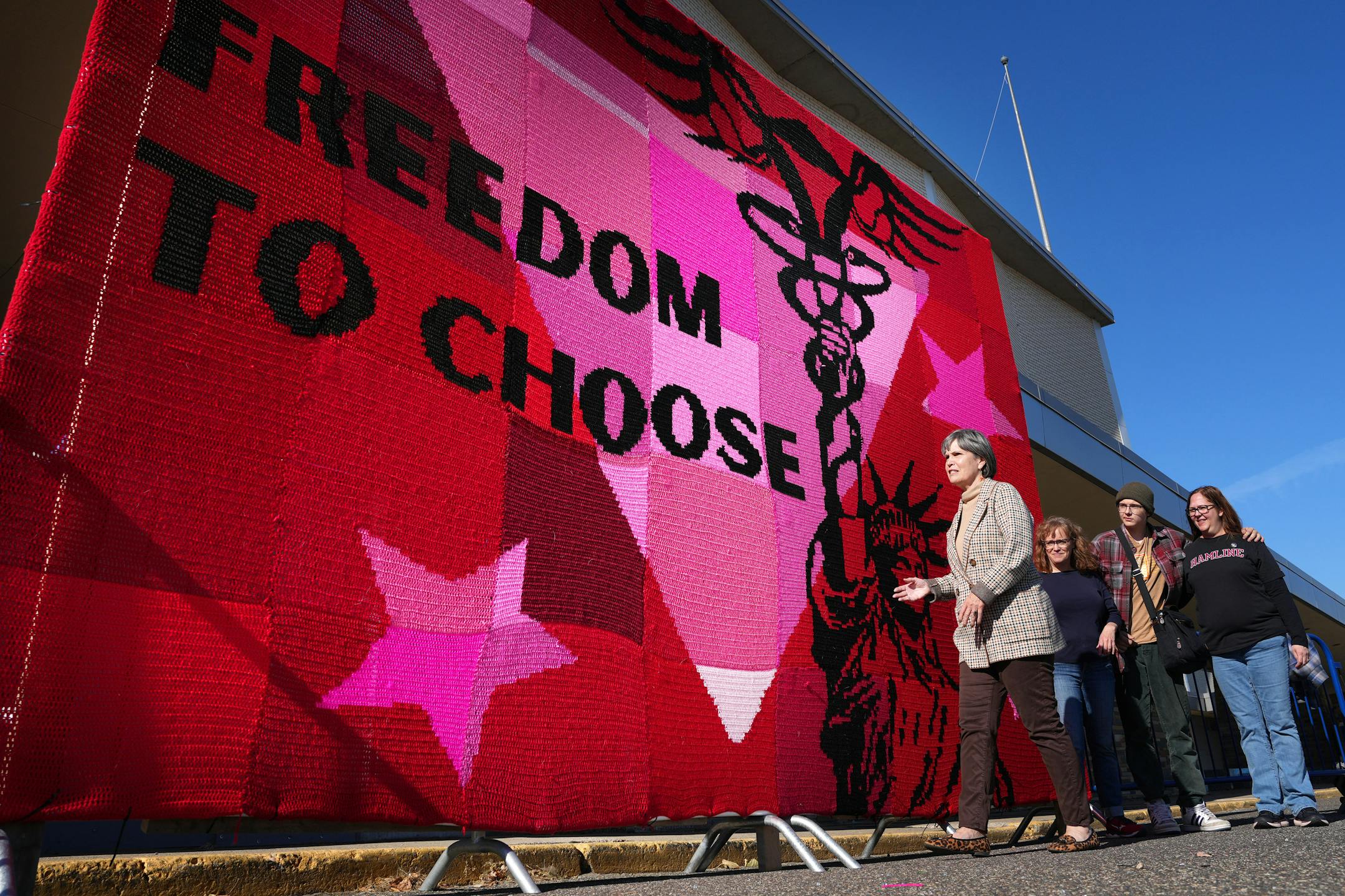 U.S. Rep. Betty McCollum stopped to view a massive crochet art instillation during the Rise for Roe event to rally voters for the DFL Saturday, Oct. 29, 2022 in the Sears parking lot in St. Paul, Minn. ] ANTHONY SOUFFLE • anthony.souffle@startribune.com