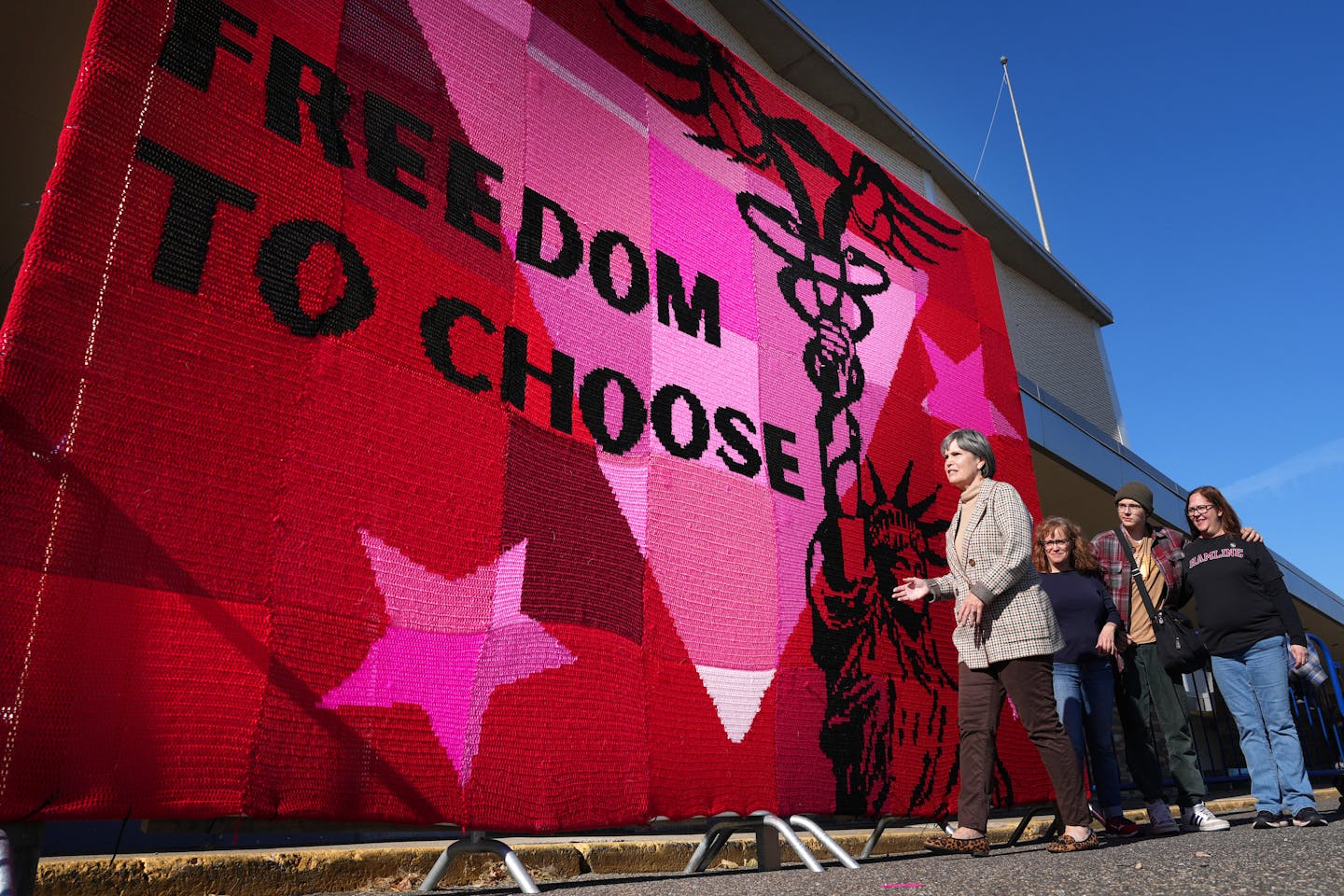 U.S. Rep. Betty McCollum stopped to view a massive crochet art instillation during the Rise for Roe event to rally voters for the DFL Saturday, Oct. 29, 2022 in the Sears parking lot in St. Paul, Minn. ] ANTHONY SOUFFLE • anthony.souffle@startribune.com