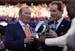 Team owner of the Denver Broncos Pat Bowlen, left, celebrates a 26-16 win against the New England Patriots in the AFC Championship game at Sports Auth