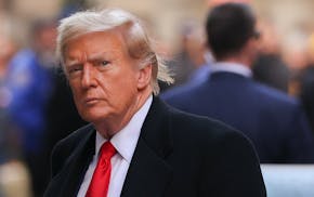 Former President Donald Trump arrives for a news conference at 40 Wall Street after a pretrial hearing at Manhattan criminal court, Monday, March 25, 