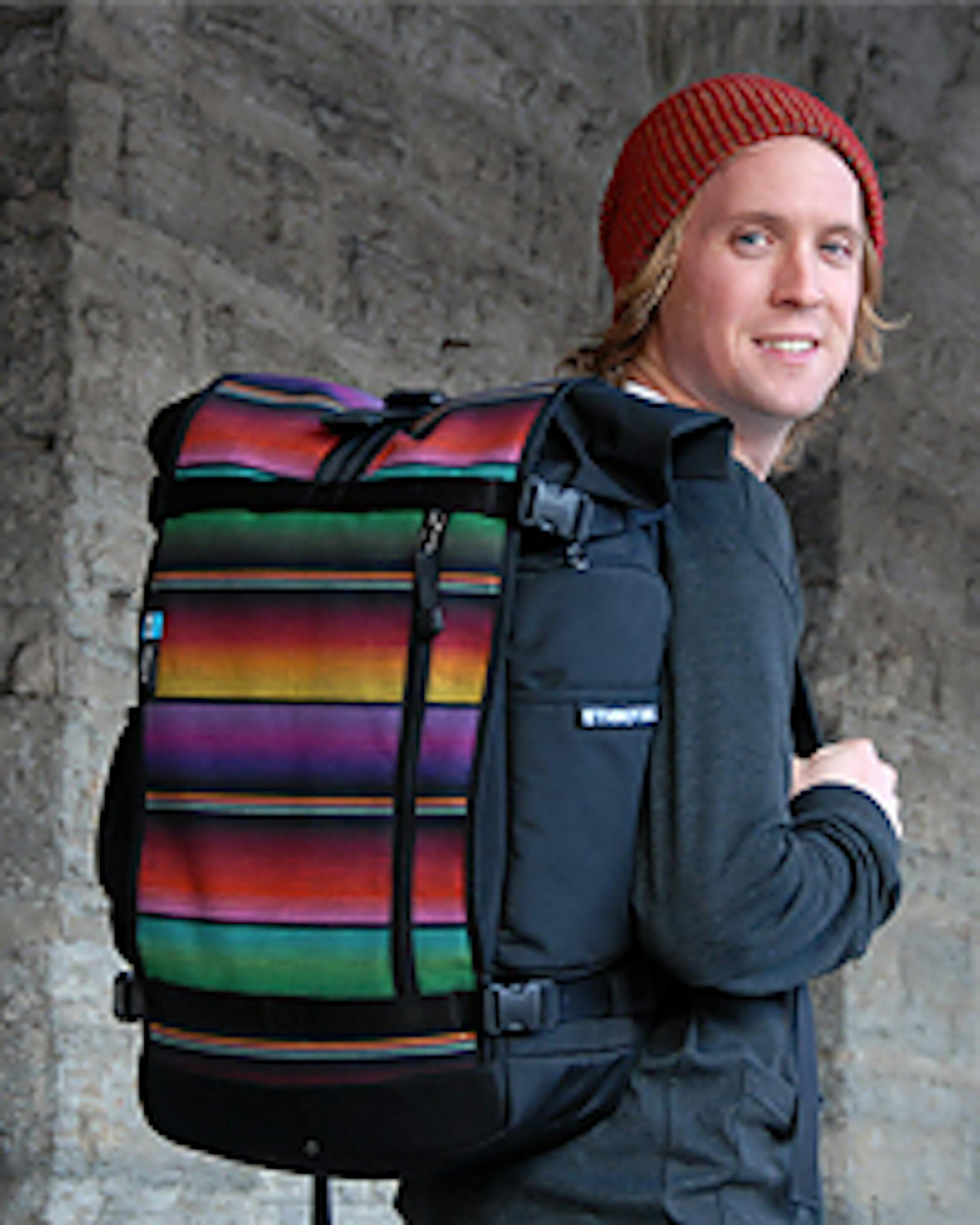 Jake Orak wearing one of his Ethnotek "culturally sustaining" backpacks