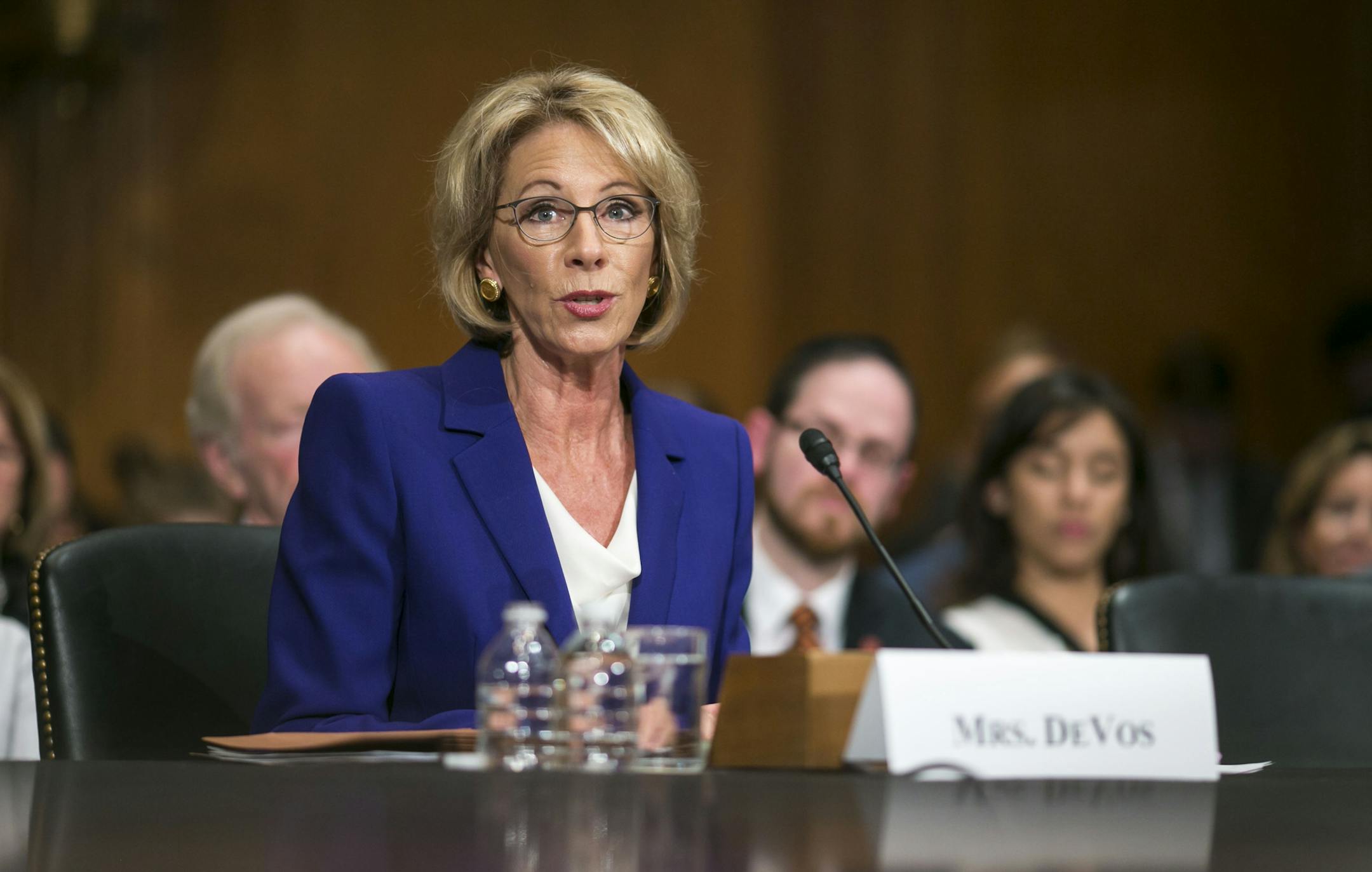 Betsy DeVos, Donald Trumpís nominee for education secretary, testifies at her confirmation hearing before the Senate Health, Education, Labor and Pensions Committee on Capitol Hill, in Washington, Jan. 17, 2017. DeVos defended her work steering taxpayer dollars from traditional public schools at her hearing on arguing that it was time to move away from a ìone size fits allî system. (Al Drago/The New York Times)