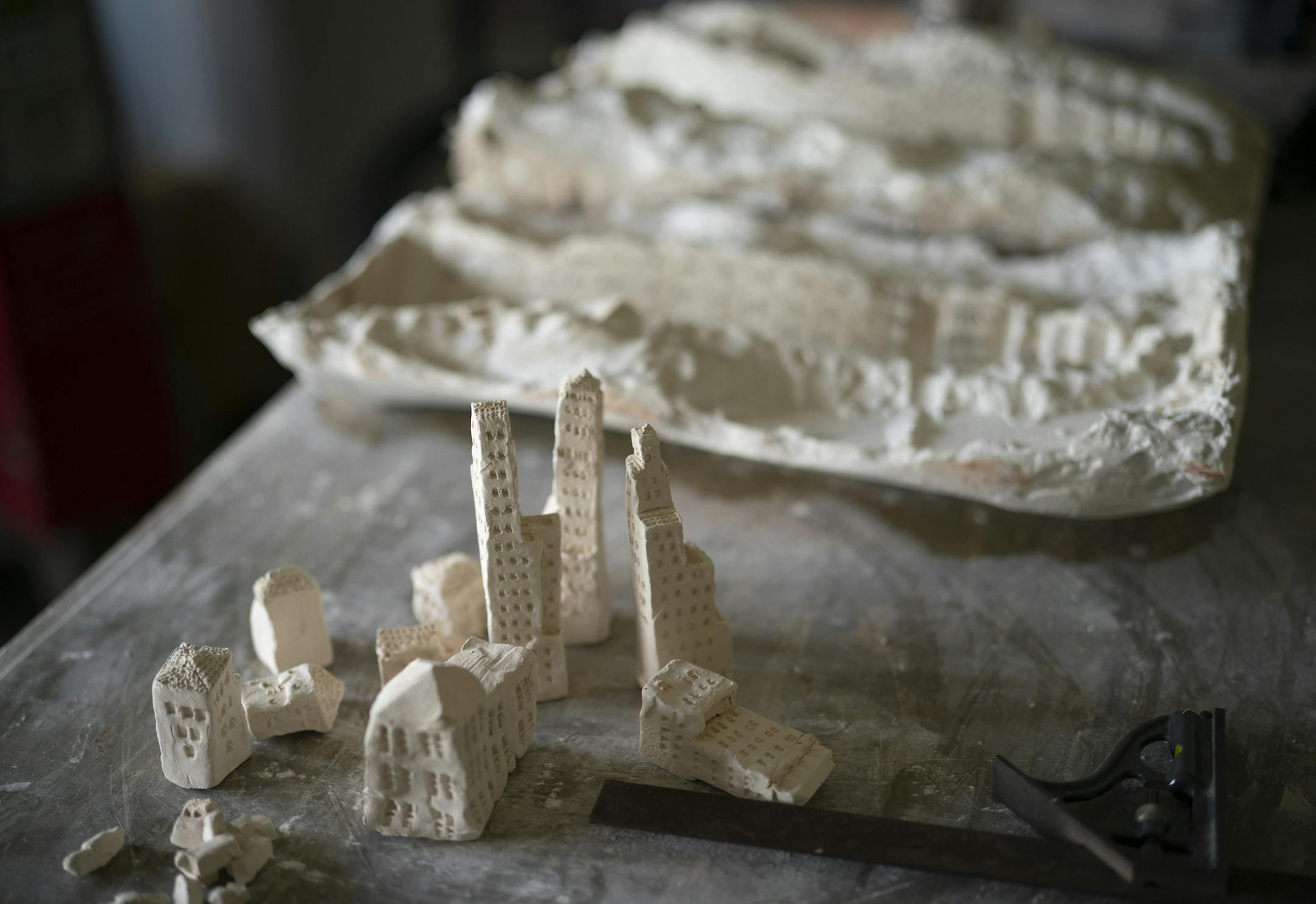 Small scale buildings on a table in Aldo Moroni's studio. ] JEFF WHEELER • jeff.wheeler@startribune.com Long-time Minneapolis artist Aldo Moroni is dying of pancreatic cancer, but still hard at work. An Italian-American from Chicago, Moroni is best known for his small-scale creations of built civilizations. He was photographed at his loft in the Pillsbury A-Mill Thursday afternoon, July 30, 2020 in Minneapolis.
