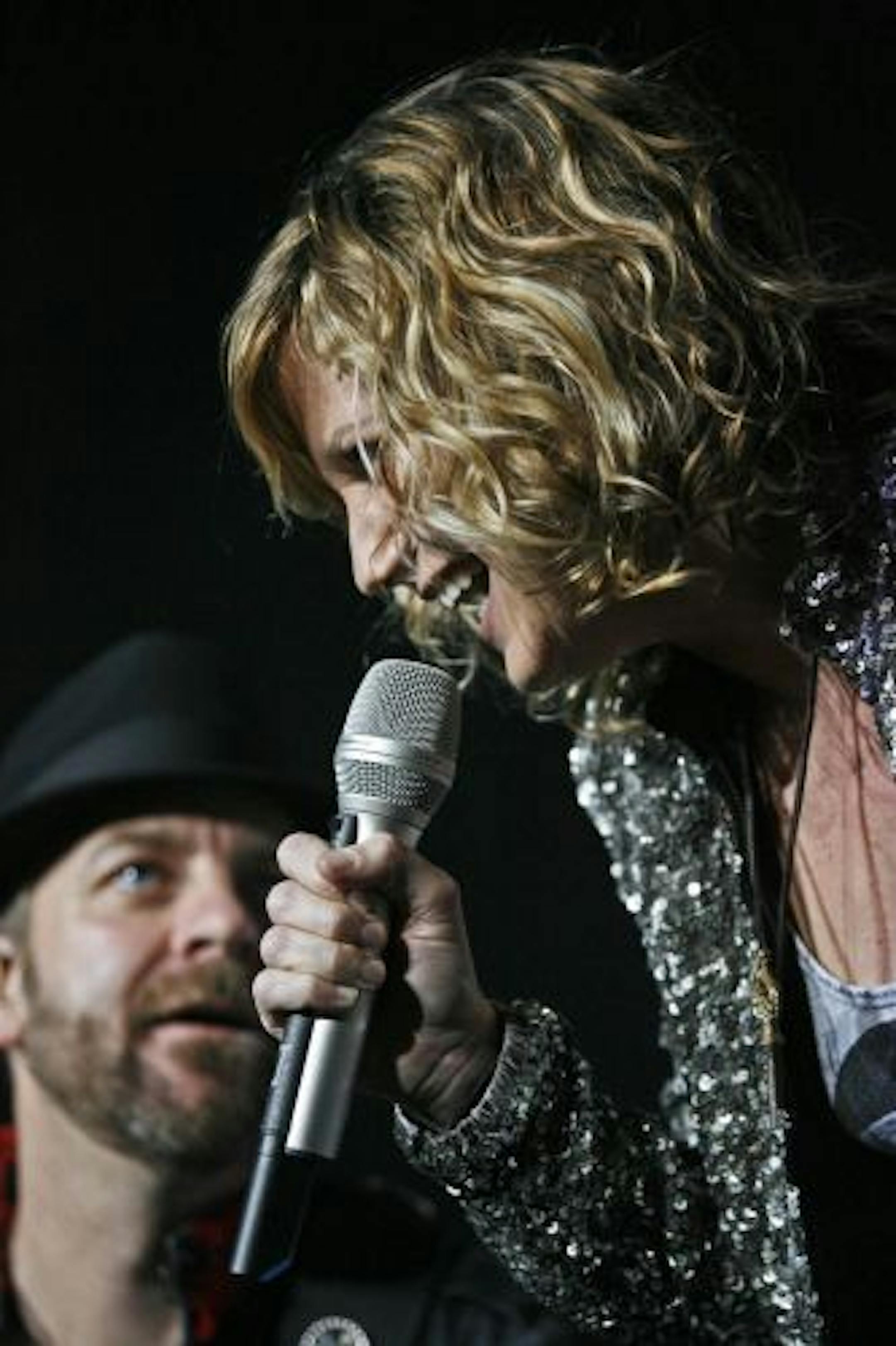 Sugarland's Jennifer Nettles and Kristian Bush were especially energetic on Friday night at Target Center.