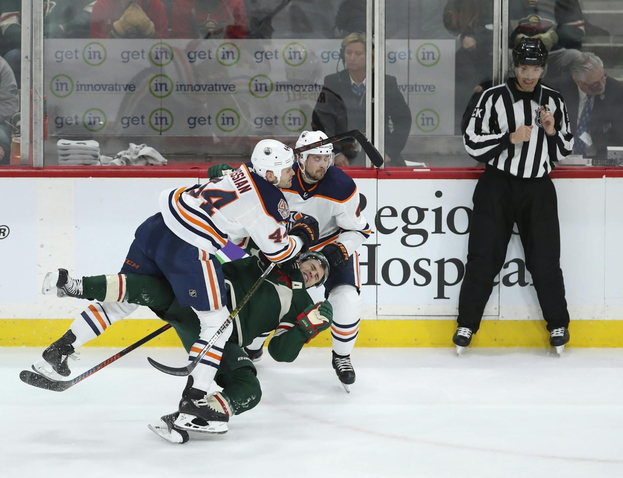 Edmonton Oilers right wing Zack Kassian (44) blindsided Minnesota Wild left wing Zach Parise (11) with a hit in the third period. There was no call on the play.