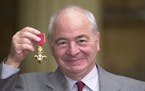 FILE - This is a Oct. 27, 2000 file photo of British author Colin Dexter after receiving an Order of the British Empire. Writer Colin Dexter, who crea