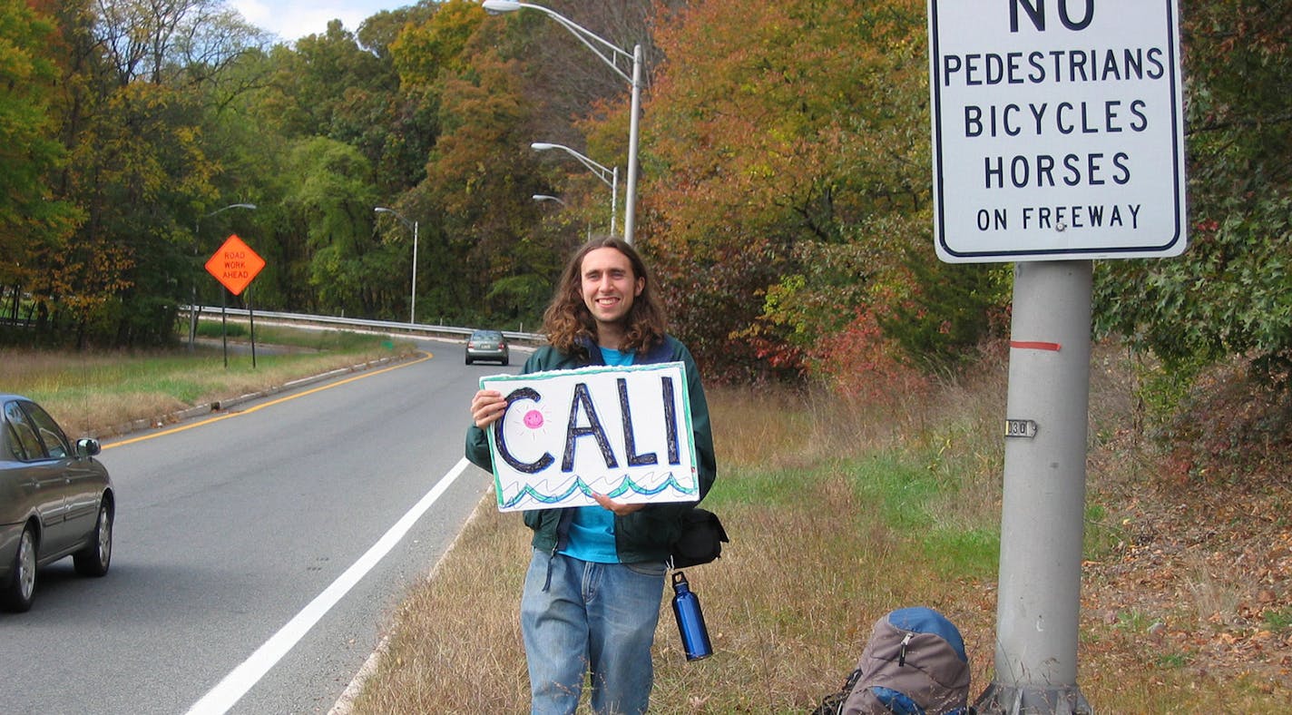 Thomas Francine, 30, of New Jersey, says the drive to hitchhike more than 26,000 miles was "in my blood."