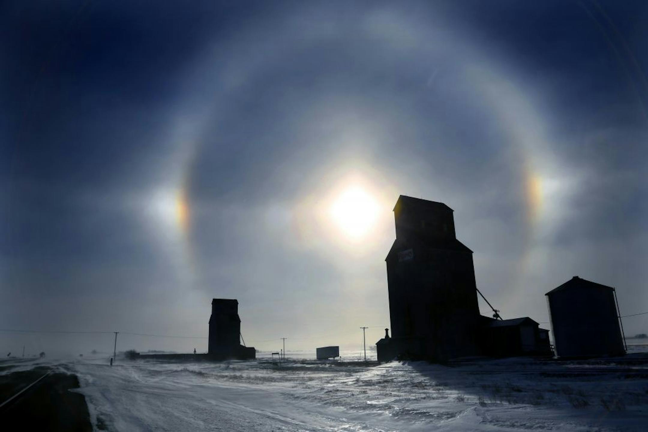 With temperatures at about 22 below zero with a -50 windchill, it was hard to find the beauty in the brutal weather. Sundogs, created by the frigid temps and frost in the atmosphere were quite beautiful along Highway 83 north of Bismark North Dakota Sunday afternoon.