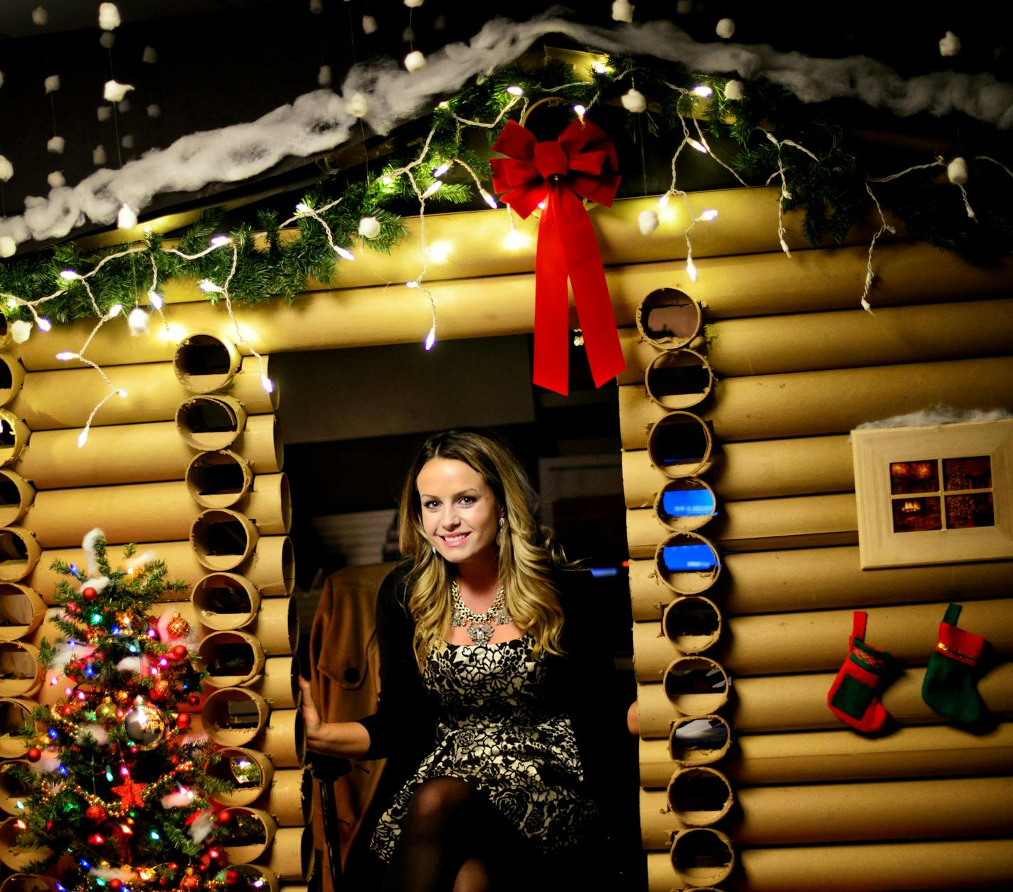 Angela Westfield, sales and catering coordinator for the W Minneapolis Foshay Tower, transformed her office cubicle into a log cabin for Christmas. ] GLEN STUBBE * gstubbe@startribune.com Monday, December 22, 2014 The "W" (Foshay tower) is having its first cube decorating contest among sales crew. Angela Westfield spent hours turning hers into a Christmas cabin.