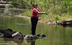 Kao Kalia Yang spent Mother’s Day this year fishing at Lake Phalen with her family.
