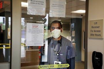 Emergency Room physician Dr. Mohammed I. Hussain seen just inside the Emergency Room entrance CentraCare Health - Monticello Thursday, May 21, 2020, i