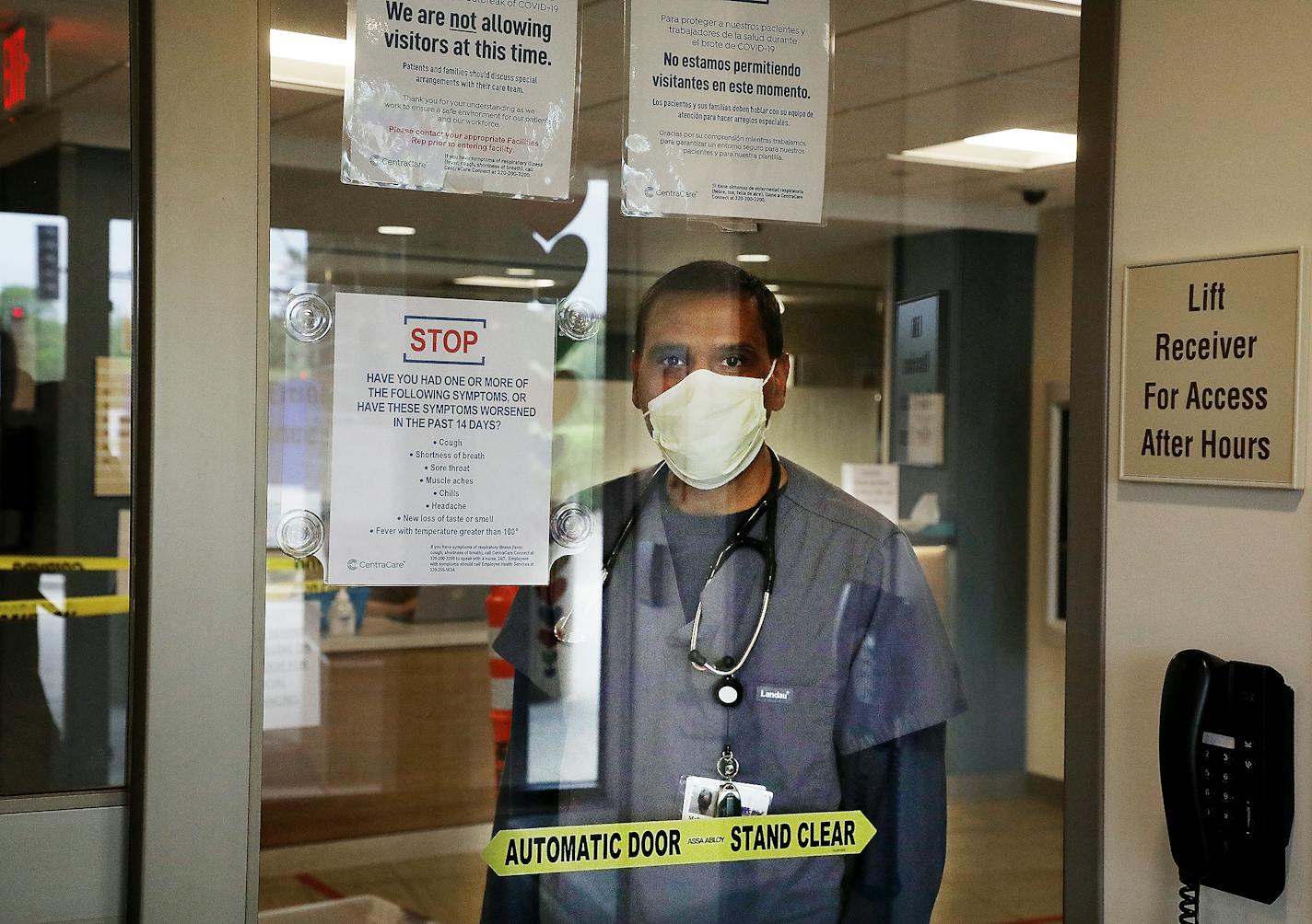 Emergency Room physician Dr. Mohammed I. Hussain seen just inside the Emergency Room entrance CentraCare Health - Monticello Thursday, May 21, 2020, in Monticello, MN.]