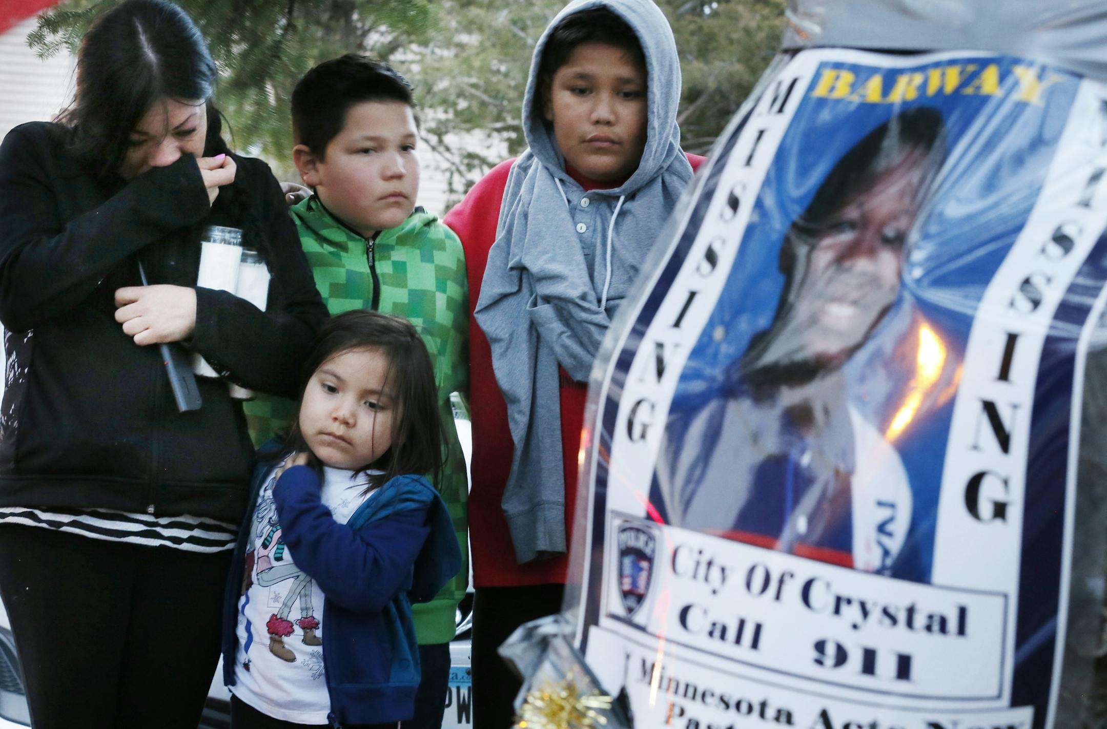 Rosario Ramirez left and her children Daniela Ramirez 5, Isaac Ramirez 9, and Juan Ramirez 11 paid their respect for Barway Collins during a vigil at Cedarwood apartments in Crystal. The Ramirez family lives in Brooklyn Center. Crystal Police Chief Stephanie Revering said that Pierre Collins is the ìPrimary suspect in what officially has become a homicide investigation in the death of his 10-year old son, Barway Collins Sunday April 12, 2015 in Crystal, Minnesota. Barway Collins the 10 year