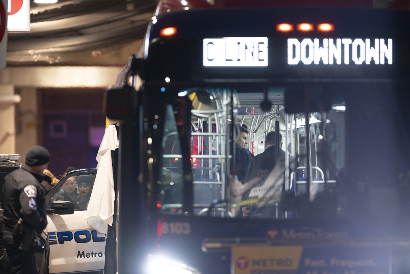 Minneapolis Police investigated the scene on the Metro Transit bus where two people were shot Thursday night. ] JEFF WHEELER &#x2022; Jeff.Wheeler@startribune.com Two people were shot on a Metro Transit bus in the transit area of the municipal parking ramp at 1st Ave. N. and 9th St. N. Thursday night, February 6, 2020 in downtown Minneapolis. One victim was dead when police arrived. The other was taken to the hospital. A suspect was arrested shortly afterwards at 7th and Nicollet.