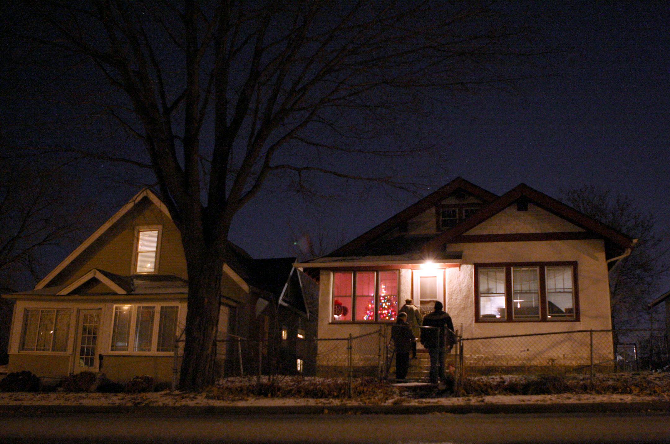 Brown, Tyrone Span and Steve Levernz knocked on doors to talk with residents about foreclosure.