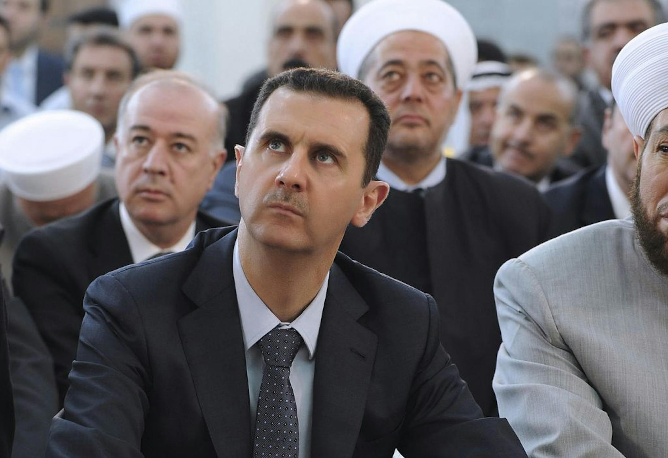 2012 photo released by the Syrian official news agency: Syrian president, Bashar Assad in the Hamad Mosque in Damascus, Syria.