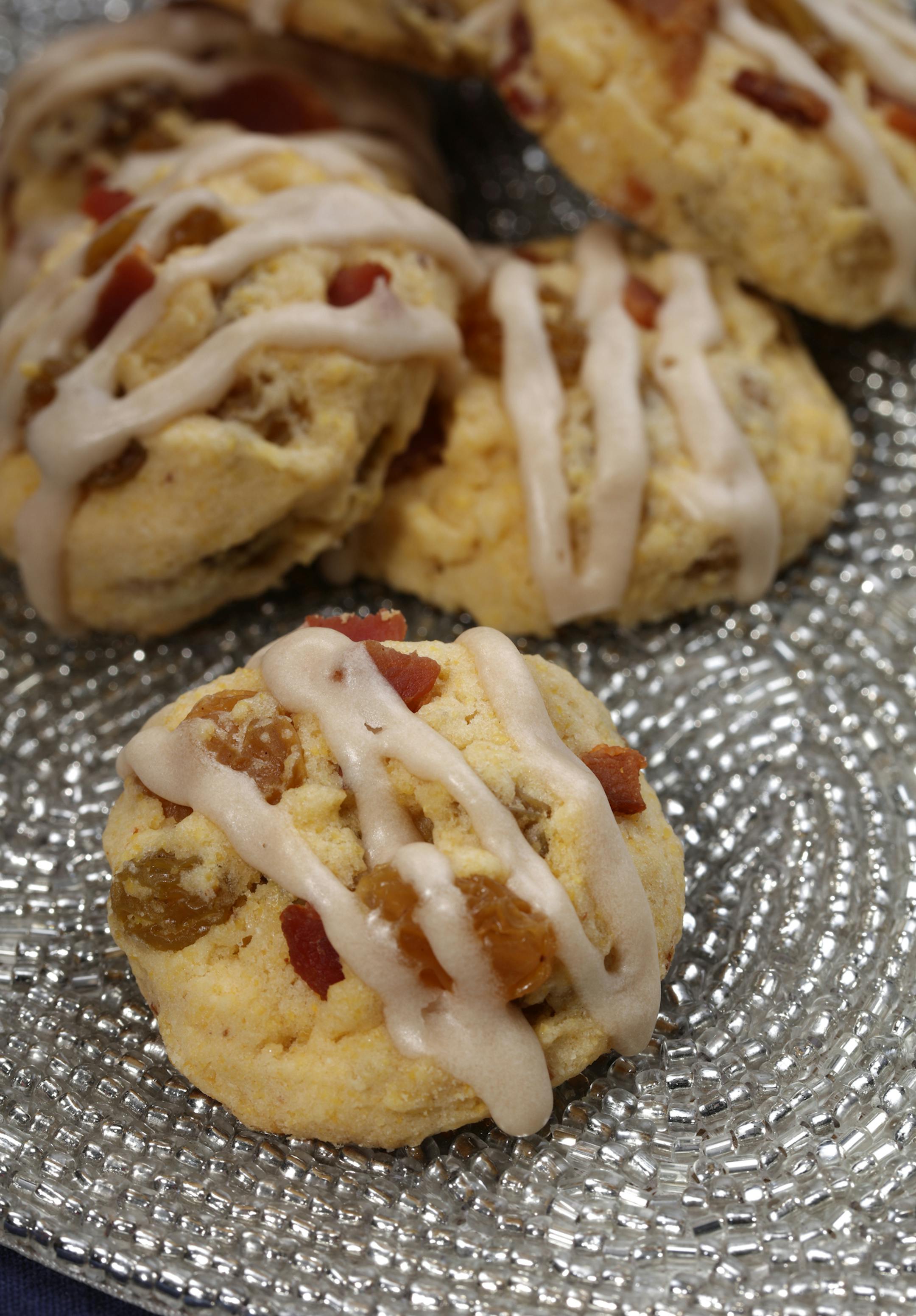 Bacon Cornmeal Venetos (by baker Julie Bollmann). ] The winner and four finalists in the 2015 Taste Holiday Cookie (Cooky) Contest: Chocolate Decadence Cookies (from baker Elaine Prebonich), Kit Kat Christmas Bars (from baker Julie Olson), Cardamom Orange Zest Sugar Cookies (from baker Jeanne Nordstrom), Bacon Cornmeal Venetos (by bakers Julie Bollmann, Wendy Kleiser, Joan Koller, Geri Olson and Mary Urbas) and winner Apple Cardamom Pecan Star Cookies (from baker Jana Freiband). Tom Wallace