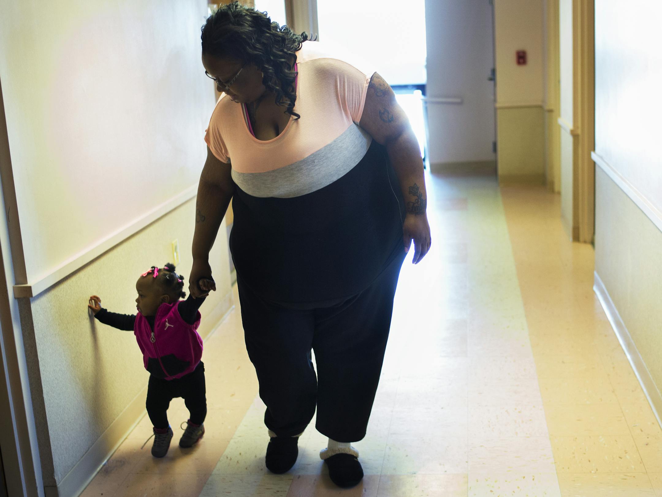 In Eagan at a homeless shelter, Taneisha Terrell and daughter Zyah,1, have gotten a voucher for Chapter 8 Housing and are looking for a placement.]] Richard Tsong-Taatarii/rtsong-taatarii@startribune.com