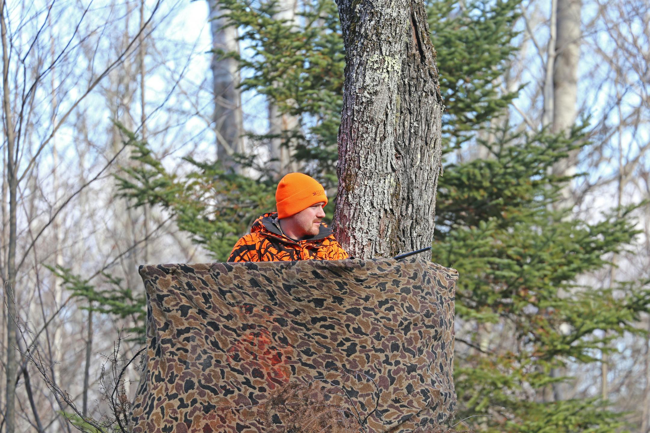 Brian Anderson of Champlin overlooked a northern Minnesota swamp near Cook on Saturday, opening day of the Minnesota firearms deer season.