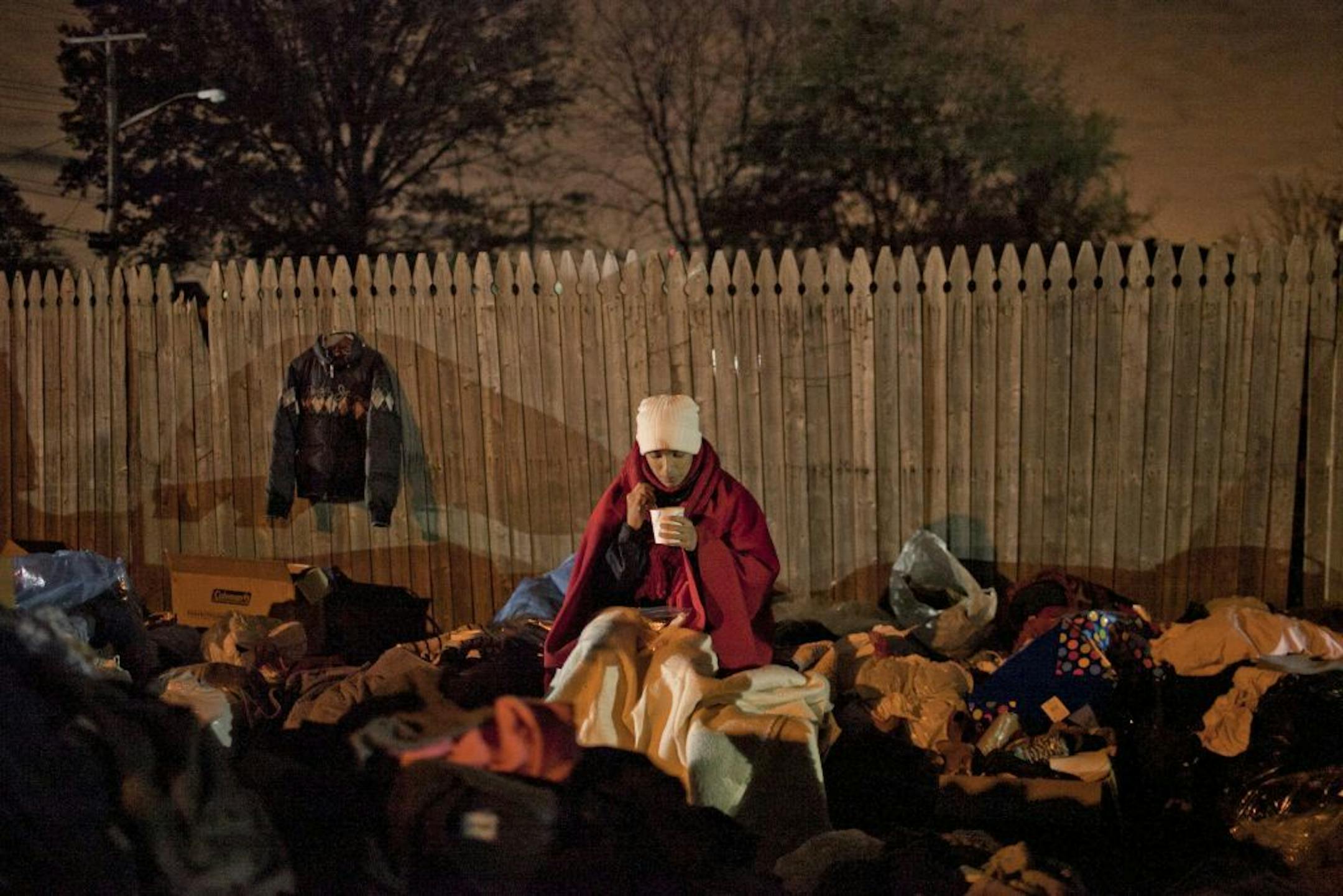Volunteer Fabrizzio Avila, 15, has a cup of soup in Midland Beach in the Staten Island borough of New York, Nov. 4, 2012. Sandy is a gauge of the region's new fragility as climate change presents the government, and the public, with some big choices on how best to rebuild.