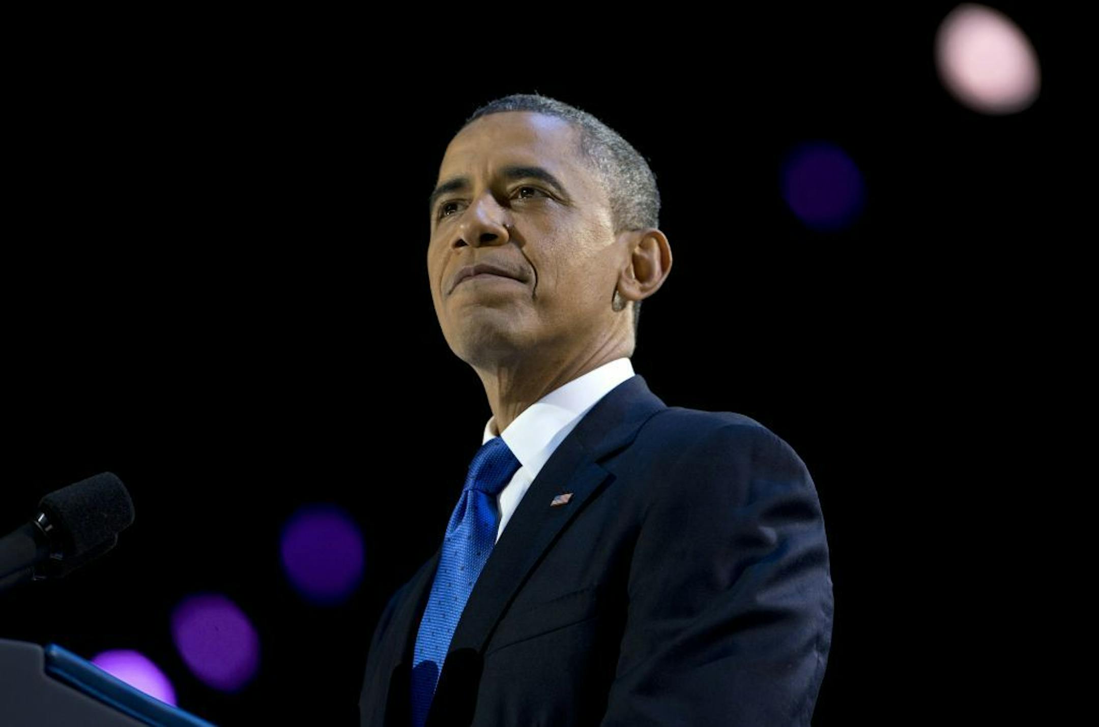 President Barack Obama pauses as he speaks at the election night party at McCormick Place, Wednesday, Nov. 7, 2012, in Chicago. Obama defeated Republican challenger former Massachusetts Gov. Mitt Romney.