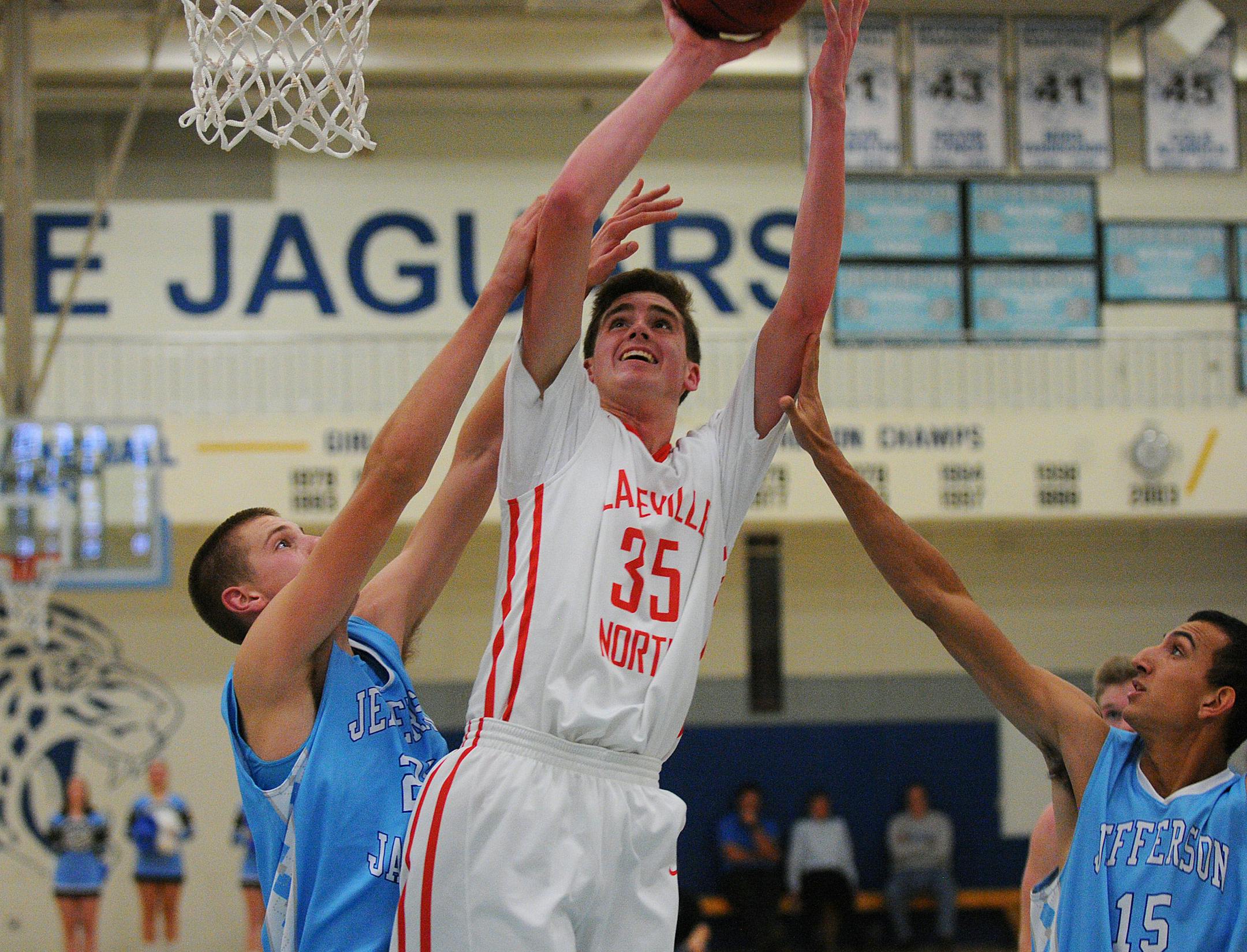 Nathan Reuvers drove the lane to score two of his game-high 23 points Tuesday night as Lakeville North recorded a 73-51 road victory over Bloomington Jefferson.