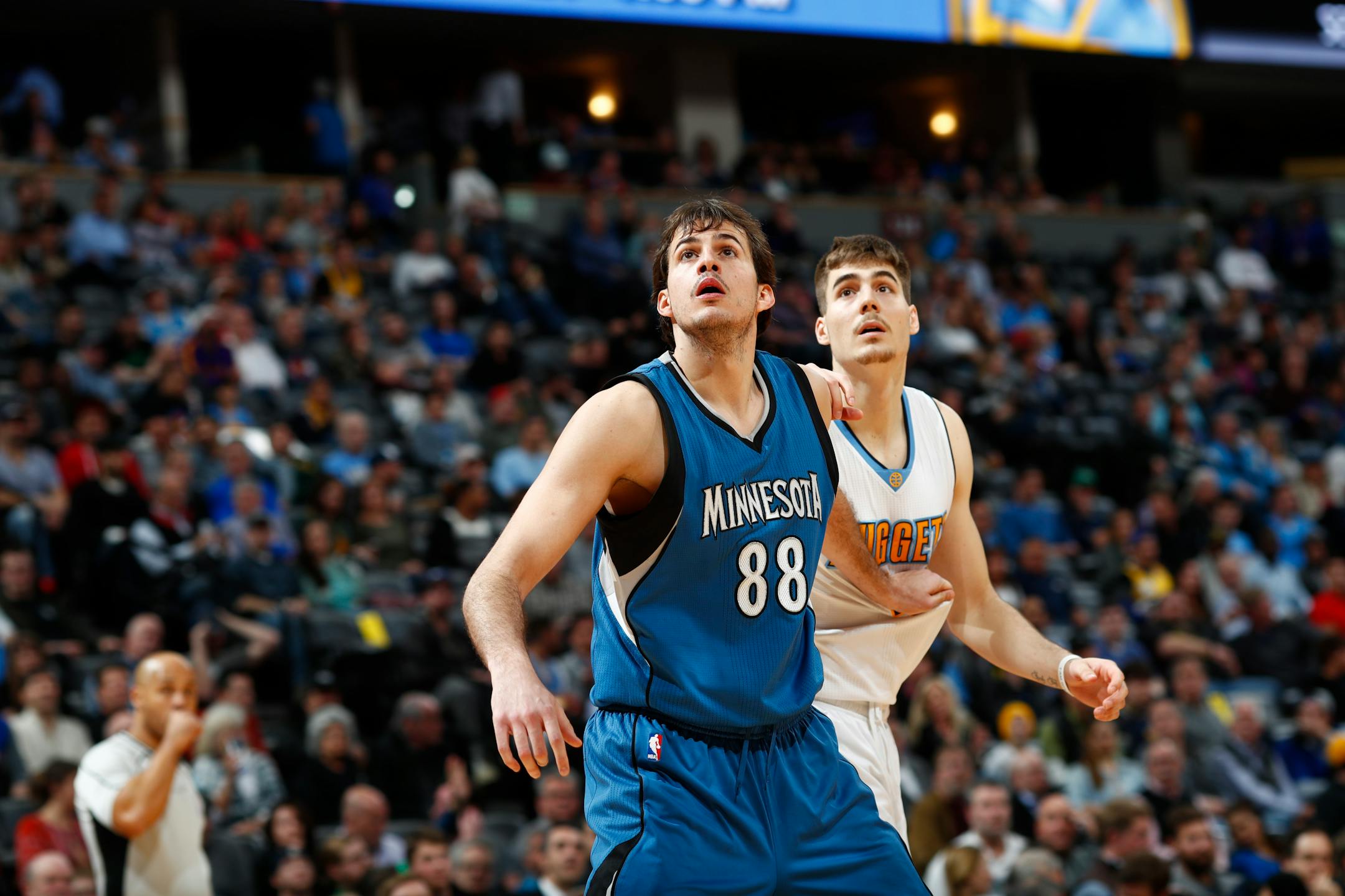 Minnesota Timberwolves forward Nemanja Bjelica (88) and Denver Nuggets forward Juancho Hernangomez (41) in the second half of an NBA basketball game Wednesday, Feb. 15, 2017, in Denver. The Timberwolves won 112-99. (AP Photo/David Zalubowski)