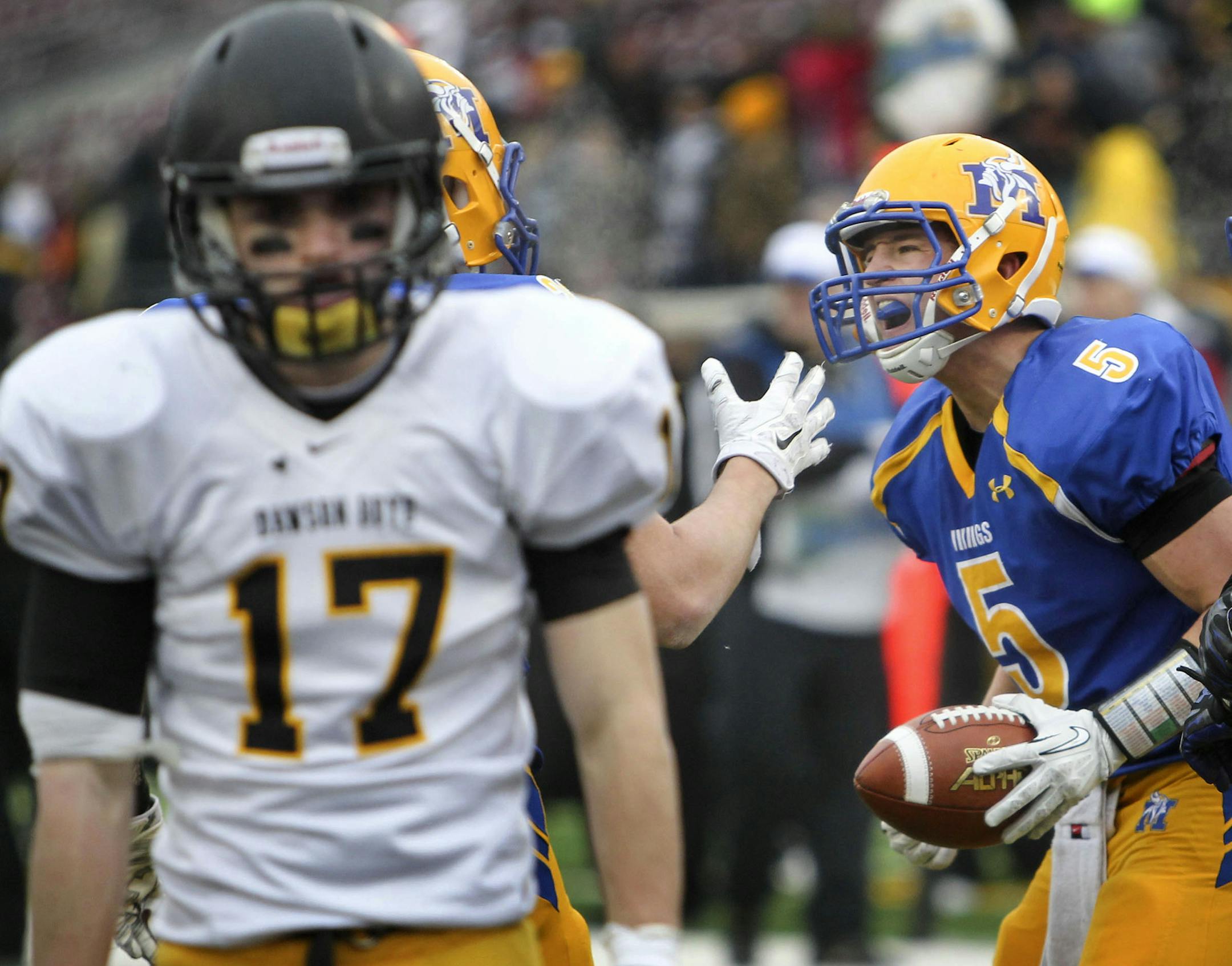 Minneota's Nicholas Esping (5) celebrates after Esping recovered a fumble by Minneota runningback Garrett Hennen for a touchdown against Dawson-Boyd during the second quarter of the 1A Minnesota State High School League football championship Saturday, Nov. 22, 2014, at TCF Bank Stadium in Minneapolis, MN.].](DAVID JOLES/STARTRIBUNE)djoles@startribune 1A Minnesota State High School League championship betweenDawson-Boyd vs. Minneota Saturday, Nov. 22, 2014, at TCF Bank Stadium in Minneapolis, MN.