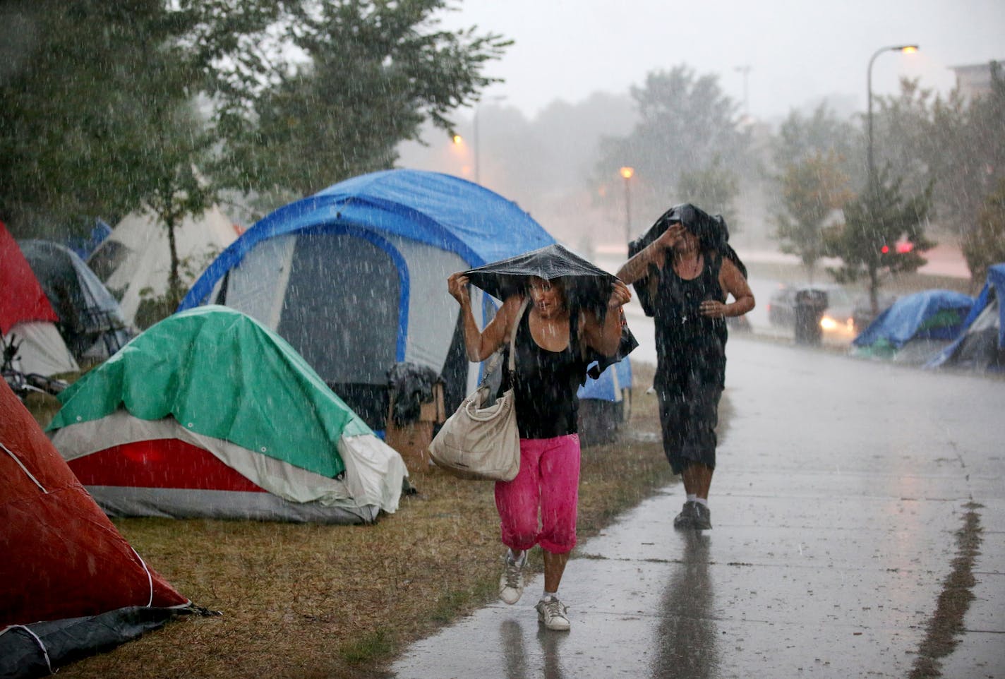 An American Indian encampment in south Minneapolis, shown in August during heavy rain.