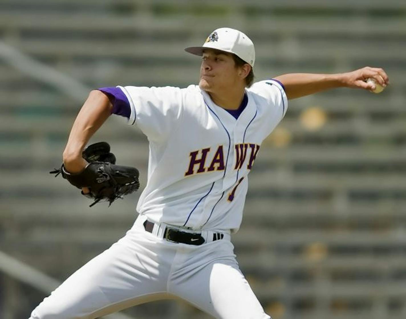 Chaska's Brad Hand pitching against Grand Rapids in the 3A quarterfinal.