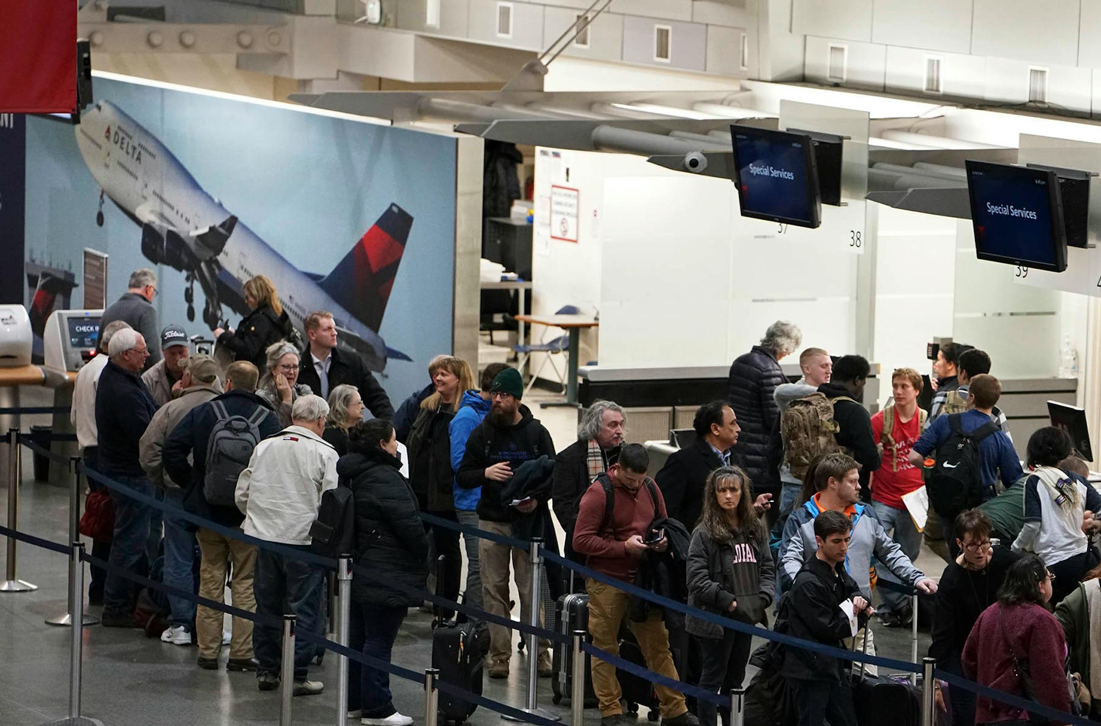 Some travelers hoped that a runway would open later in the evening so a few flights could leave.