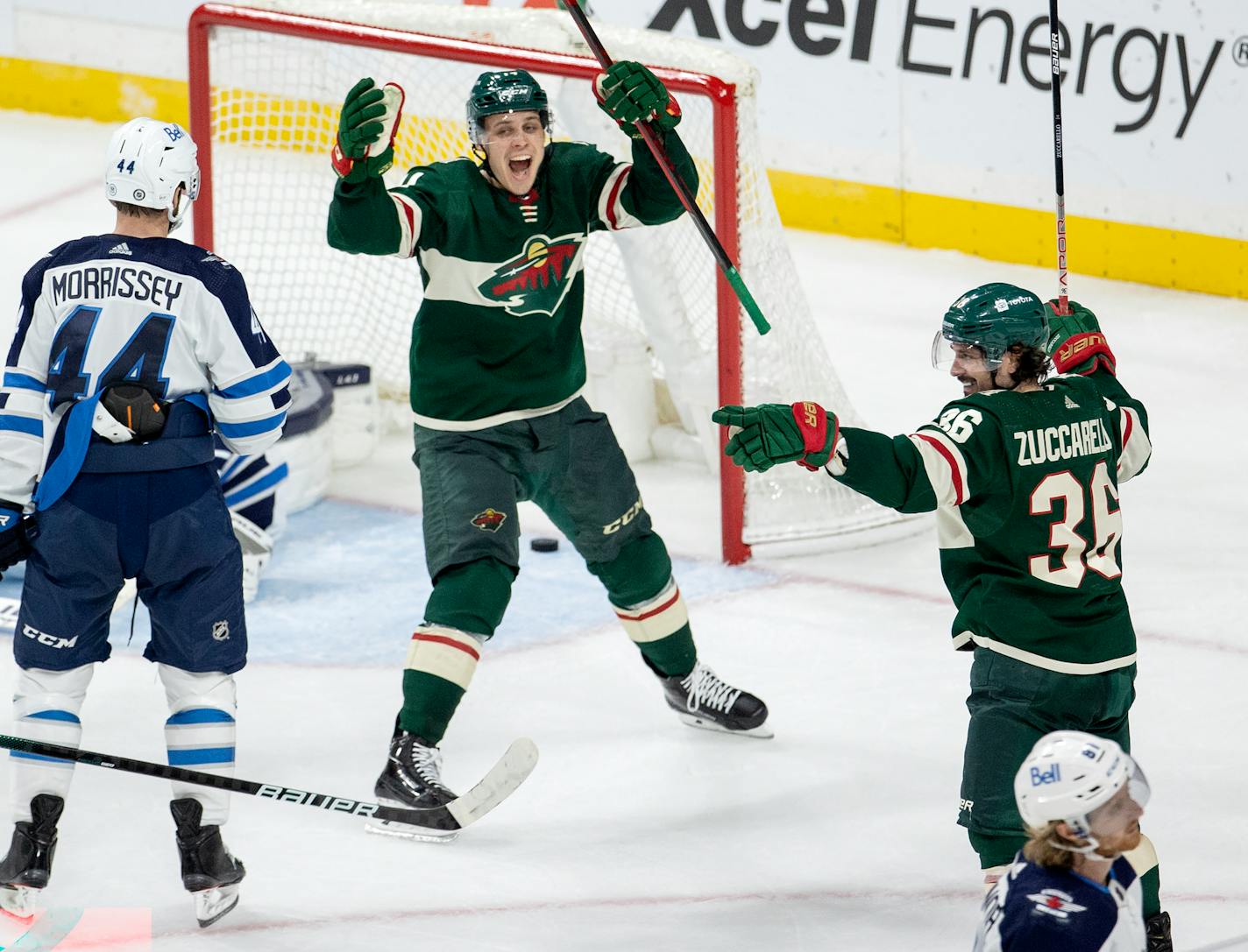 Joel Eriksson Ek (14) of the Minnesota Wild celebrates after a Mats Zuccarello (36) goal during the second period Tuesday, Oct. 19 at Xcel Energy Center in St. Paul, Minn.