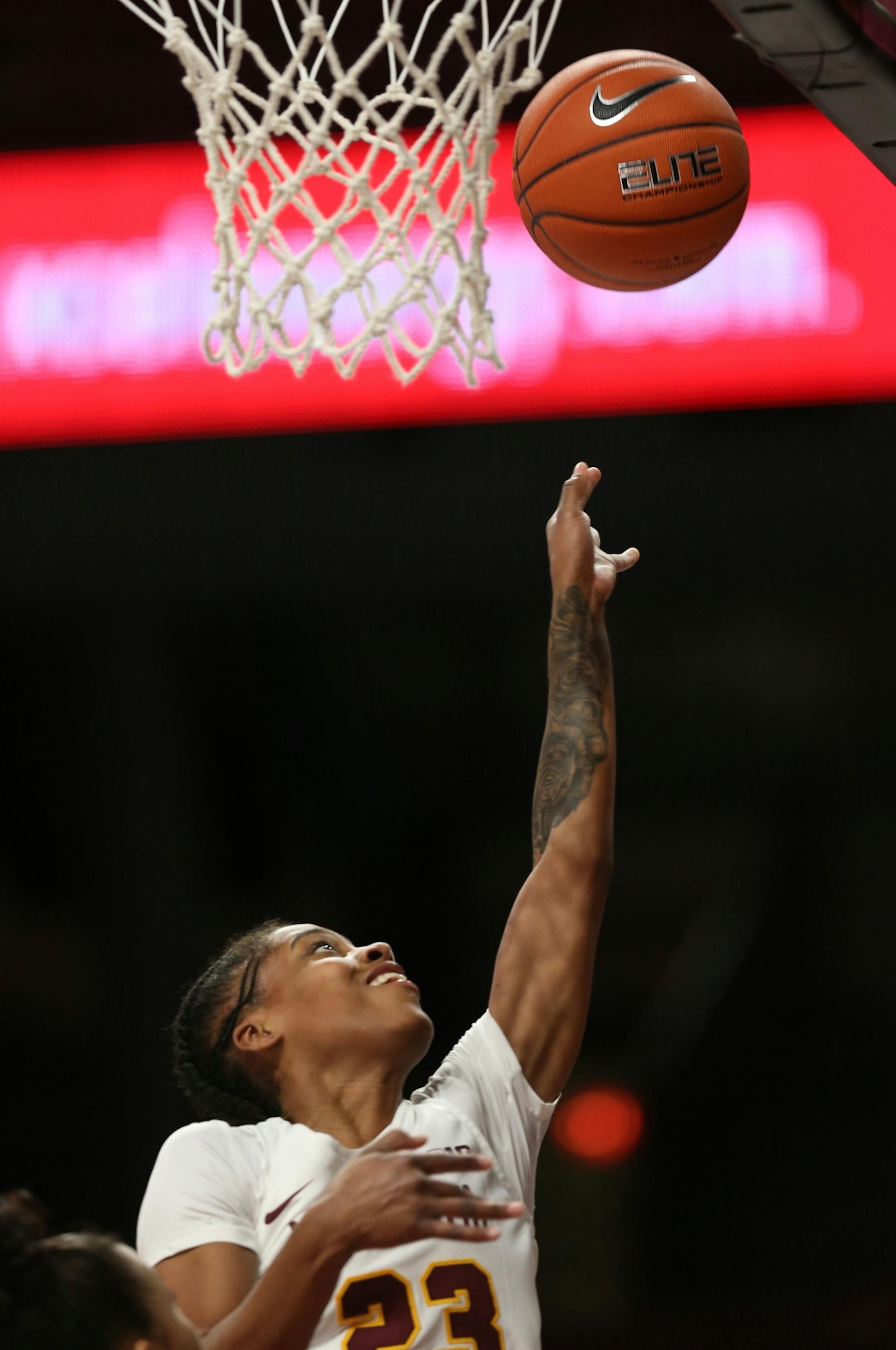 Kenisha Bell(23) puts up a layup.