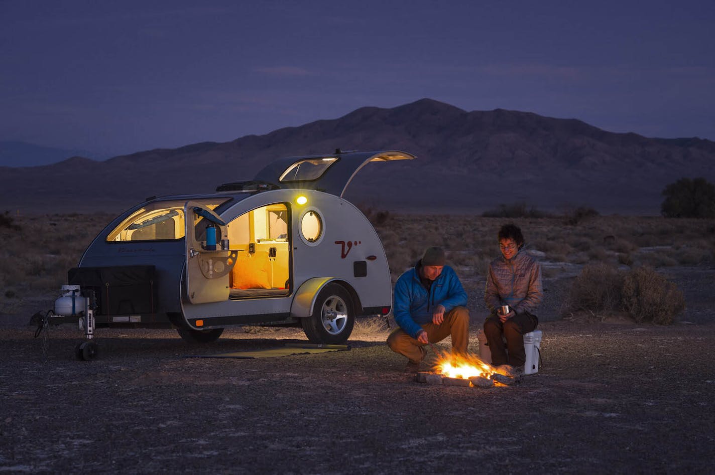 Kurt and Edwige Moses camp for the night in their teardrop camper trailer, built by St. Paul company Vistabule.