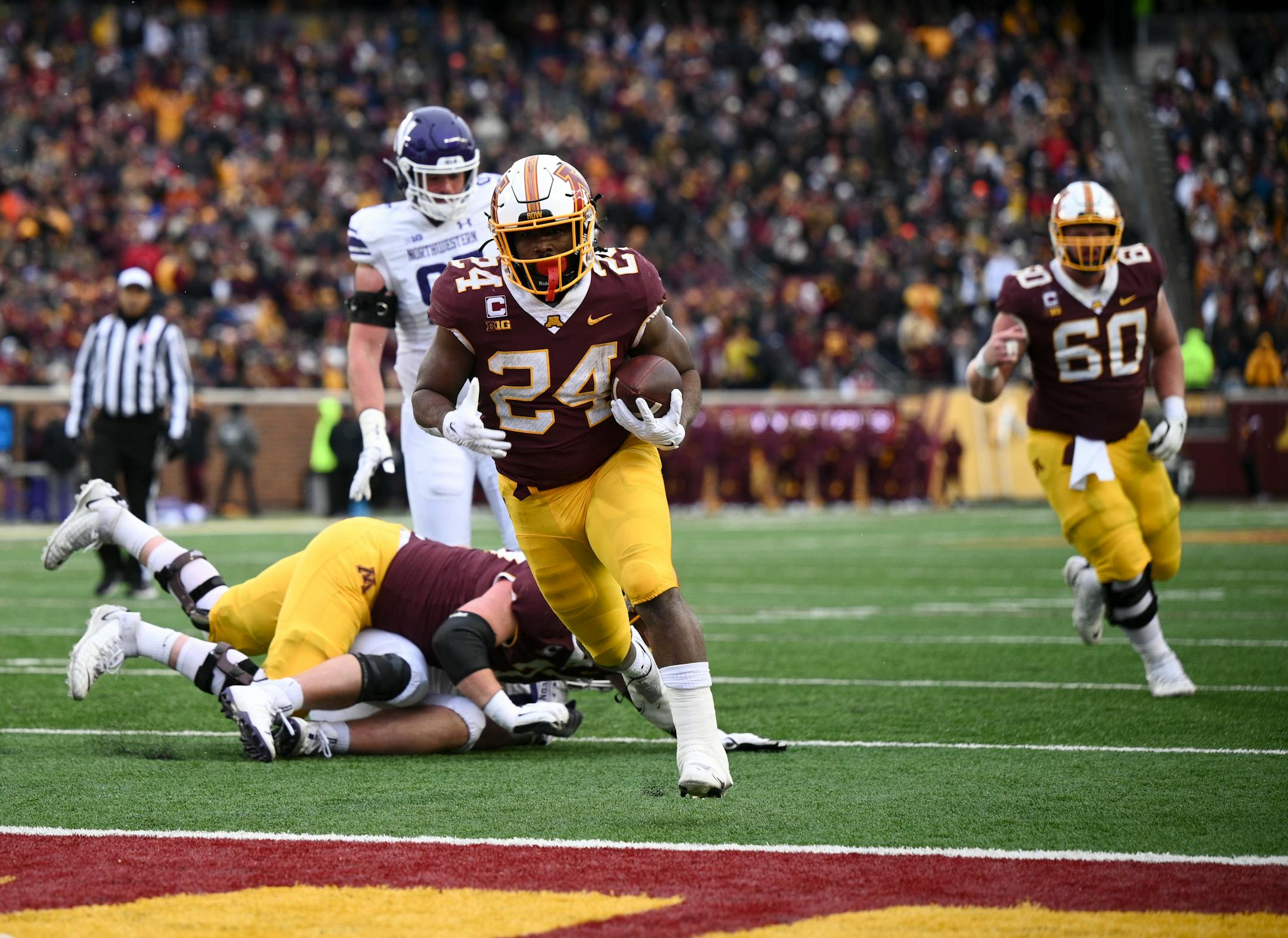 Minnesota Gophers running back Mohamed Ibrahim (24) rushes for a touchdown against the Northwestern Wildcats during the first half Saturday, Nov. 12, 2022 at Huntington Bank Stadium in Minneapolis, Minn.