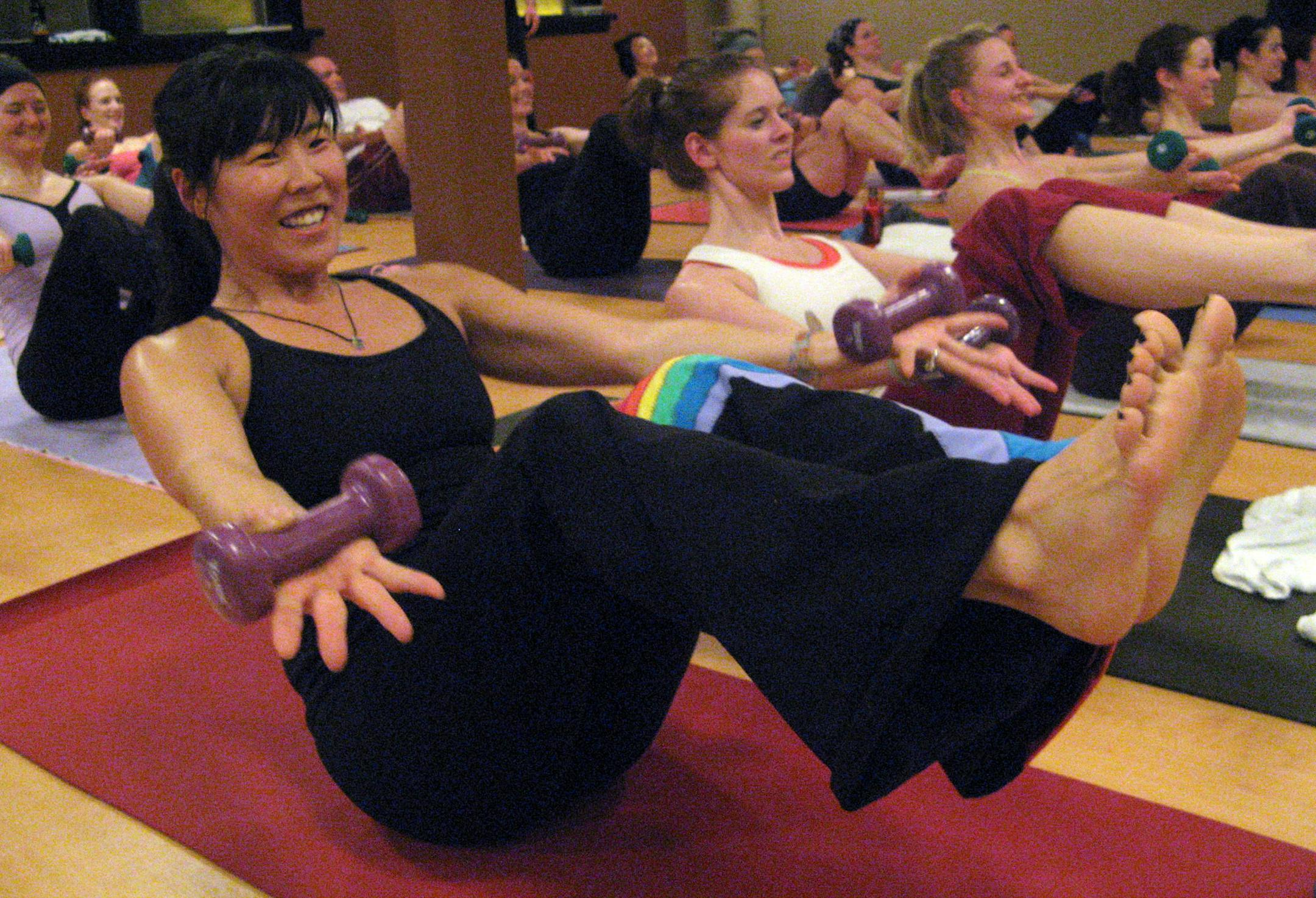Corepower Yoga instructor Tobi Lynden led a vibrant Sculpt Yoga class in St. Paul last week, using weights with traditional yoga poses and funky music to help 40 participants get stronger, improve balance and have fun.