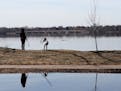The weather was just right for a walk and a bit of stick tossing on Lake Nokomis on Tuesday.