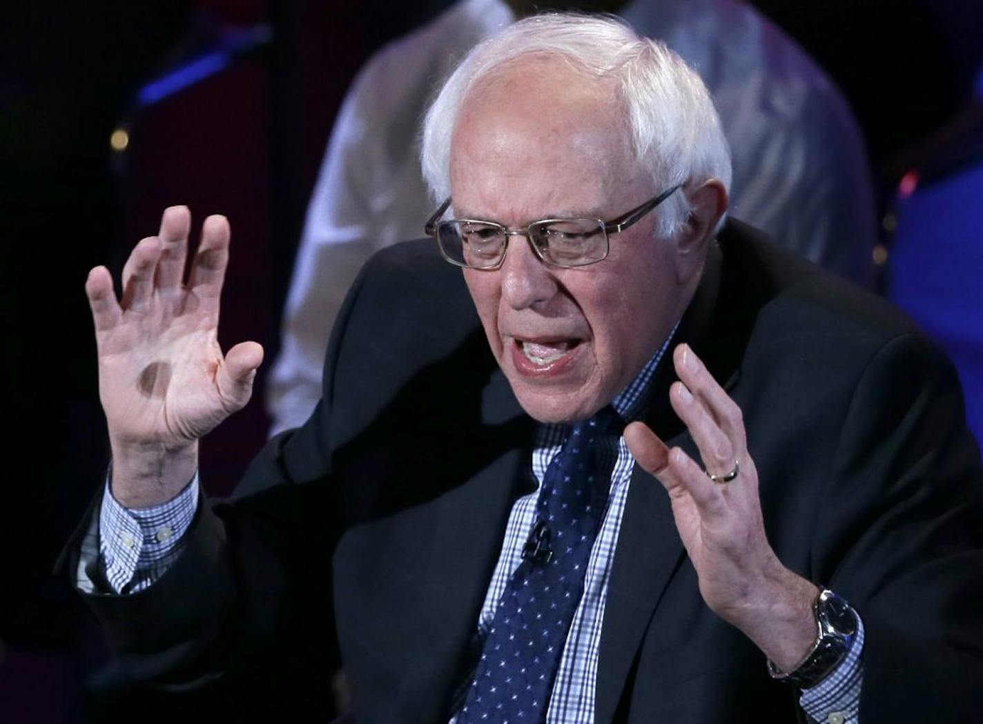 Democratic presidential candidate, Sen. Bernie Sanders, I-Vt, argues a point during the Brown & Black Forum, Monday, Jan. 11, 2016, in Des Moines, Iowa.