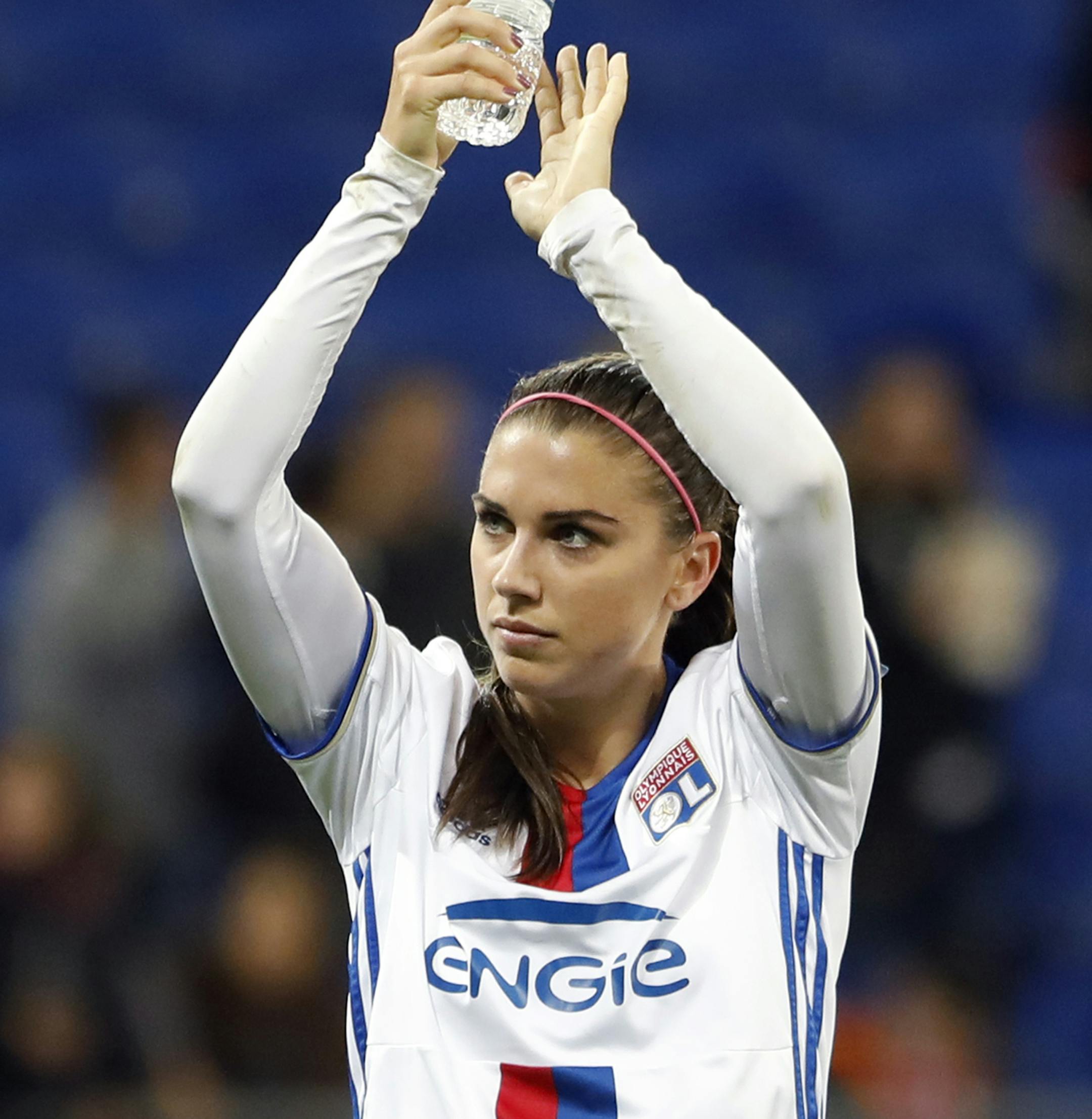 Lyon's Alex Morgan celebrates after they won their Women's Champions League semifinal soccer match against Manchester City in Decines, near Lyon, central France, Saturday, April 29, 2017. (AP Photo/Laurent Cipriani) ORG XMIT: MIN2017050516092626