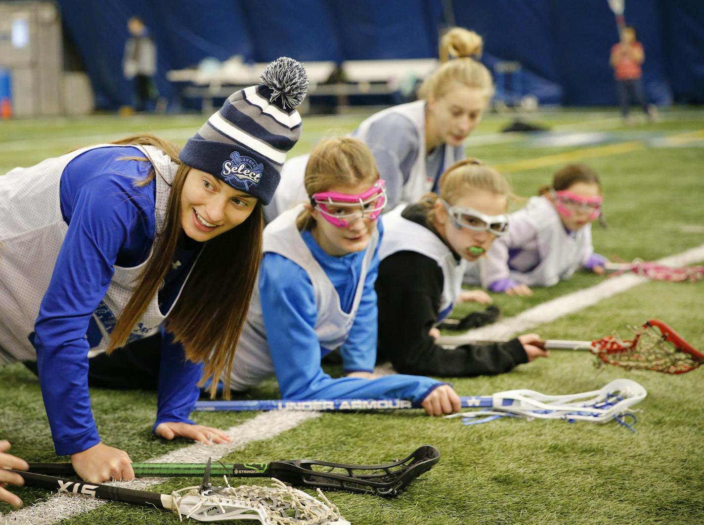 Minnetonka High School senior Lily Hohag volunteered to help teach young girls to play Lacrosse on a Saturday morning in February. ] Shari L. Gross &#x2022; shari.gross@startribune.com Students at Minnetonka High can letter in volunteering, in addition to athletics and academics. Senior Lily Hohag volunteers to teach little girls lacrosse skills every Saturday morning for six weeks. She has lettered in volunteering all four years doing a variety of activities.