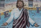"Love Power" Jesus mural in Minneapolis' West Bank neighborhood Thursday, Aug. 3, 2017, in Minneapolis, MN.