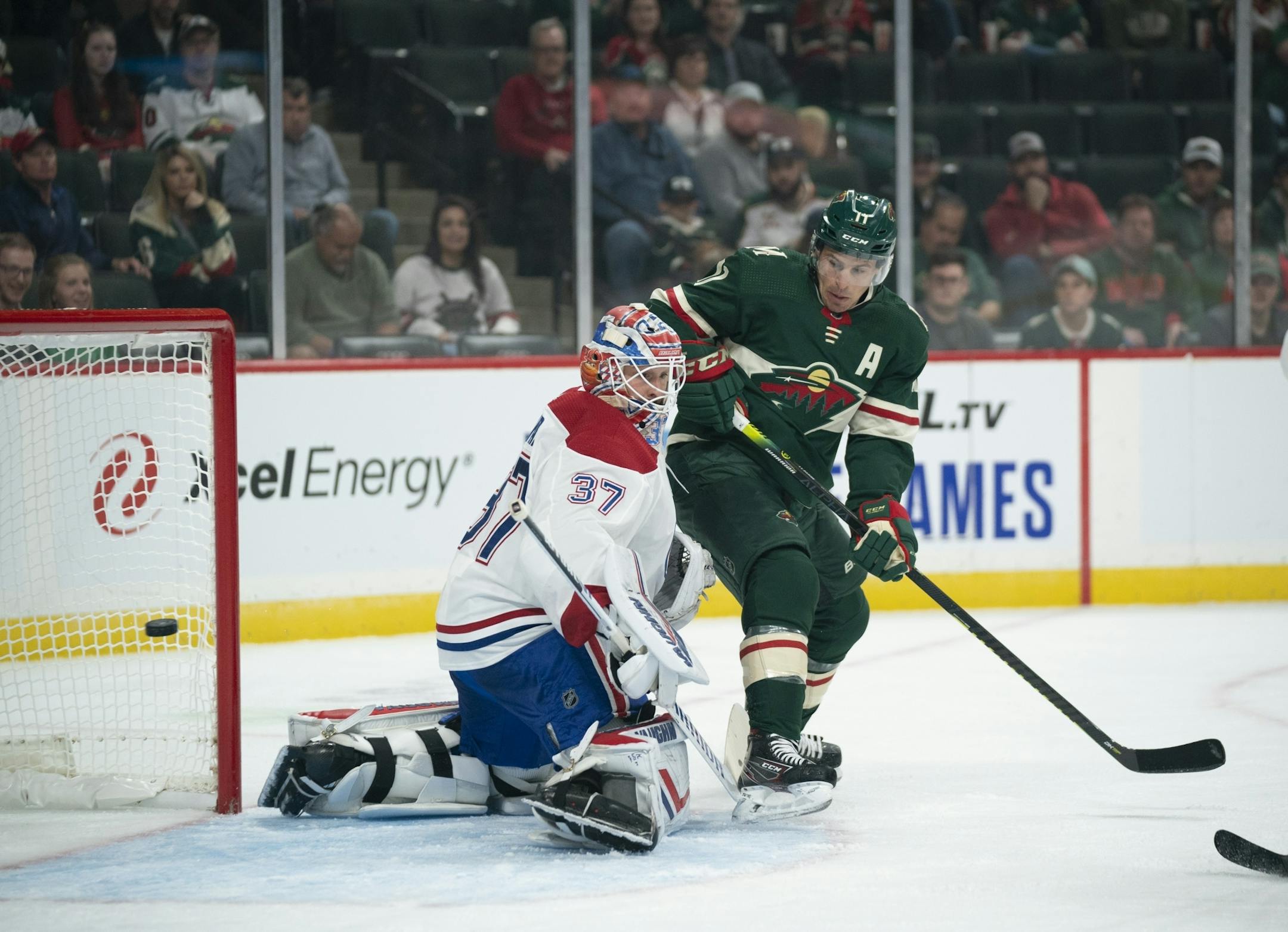 Minnesota Wild left wing Zach Parise (11) watched teammate Jason Zucker's first period shot head into the Montreal net past goaltender Keith Kinkaid (37) for a first period goal.