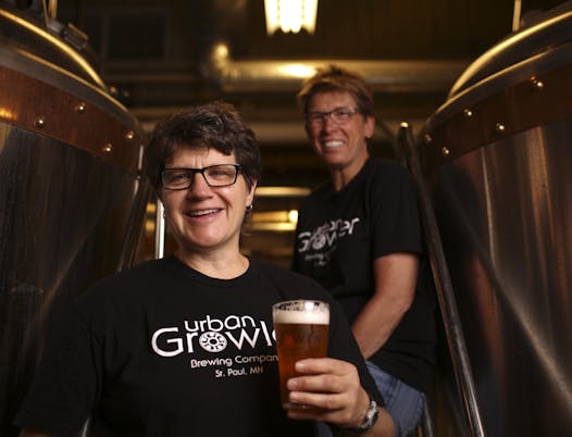 Deb Loch, head brewer at Urban Growler Brewing Co., front, and co-founder, Jill Pavlak.