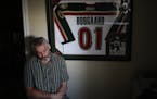 Len Boogaard, who encouraged his son Derek Boogaard's hockey career, next to Derek's jersey, in Ottawa, Ontario, Canada, Aug. 30, 2011.