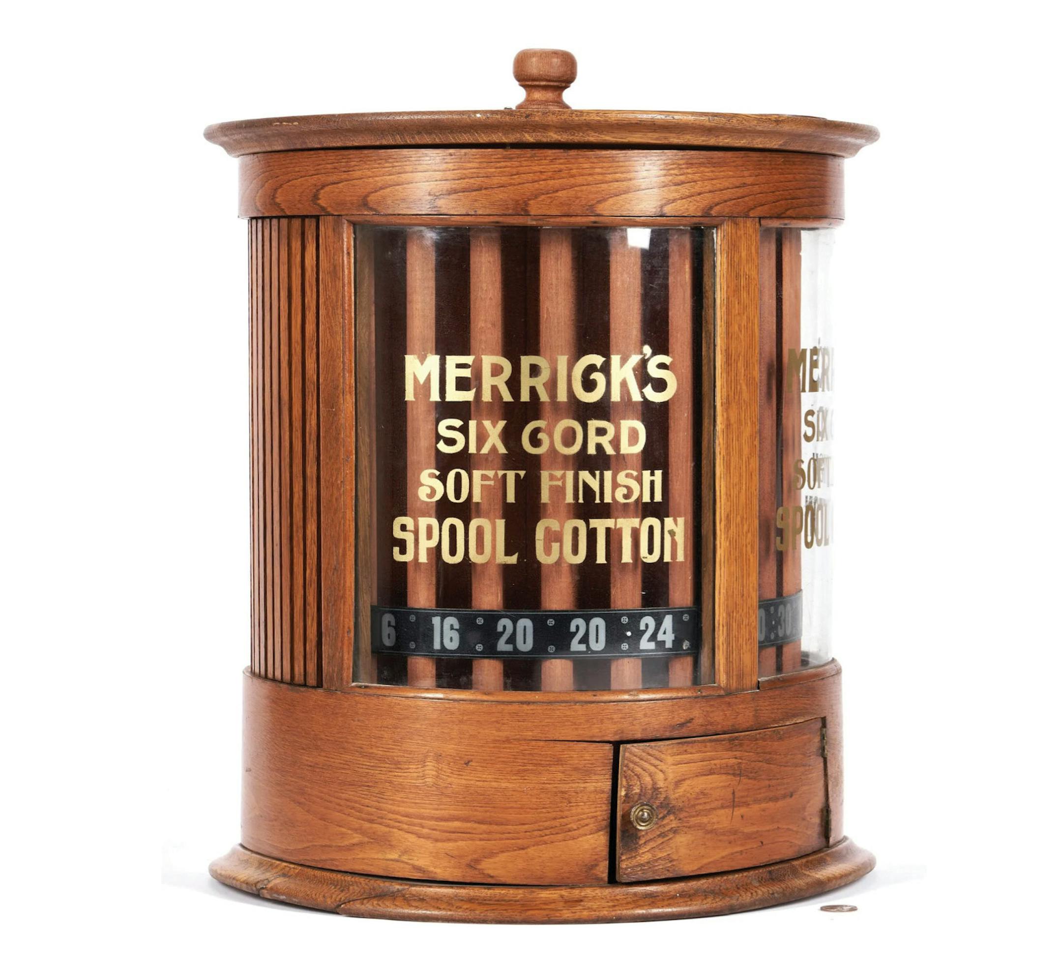 The Merrick Thread Co. is known for its spool cabinets with rotating displays behind glass. They tend to sell for higher prices than the typical chest-of-drawers spool cabinet. Cowles Syndicate