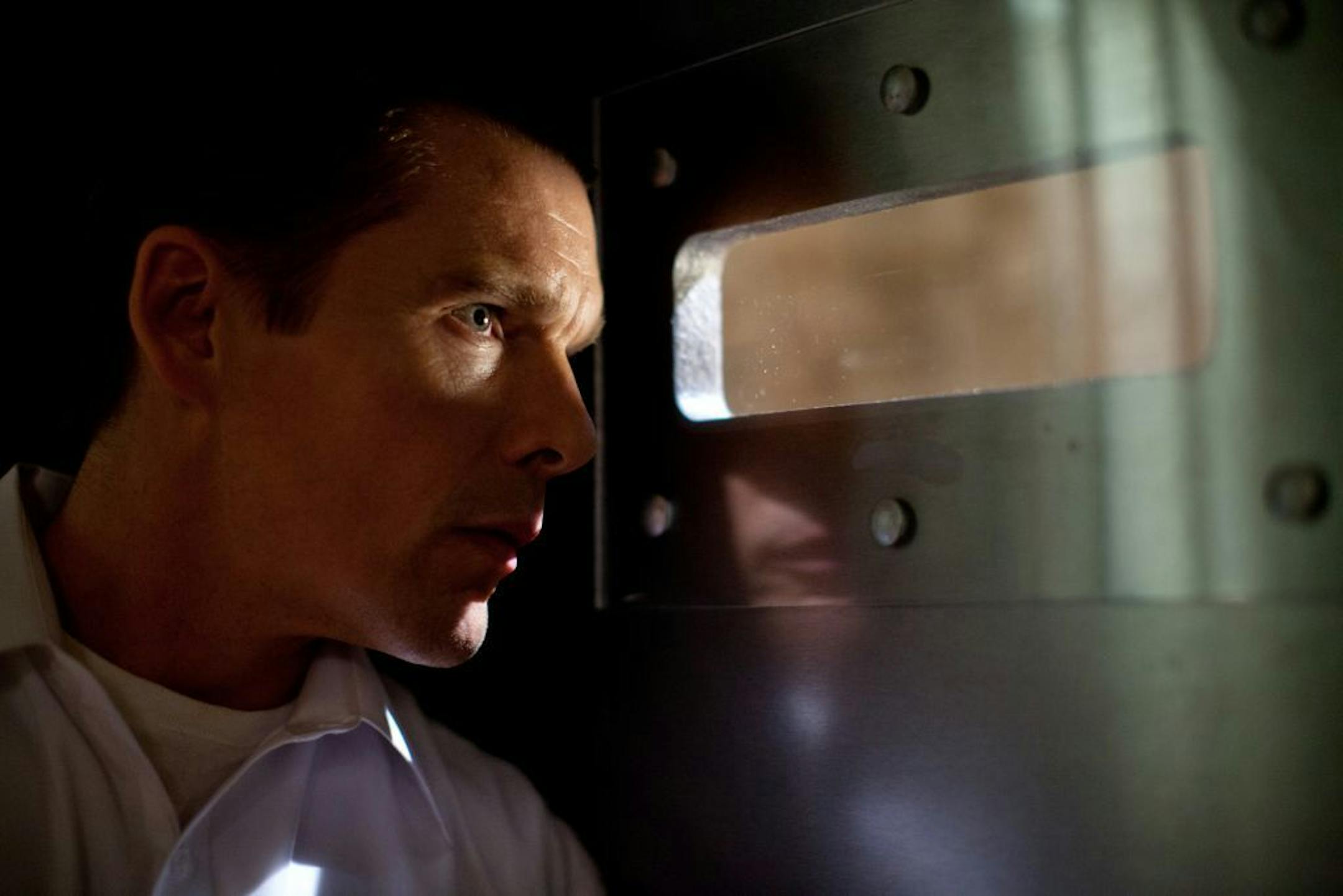 This film image released by Universal Pictures shows Ethan Hawke in a scene from "The Purge."
