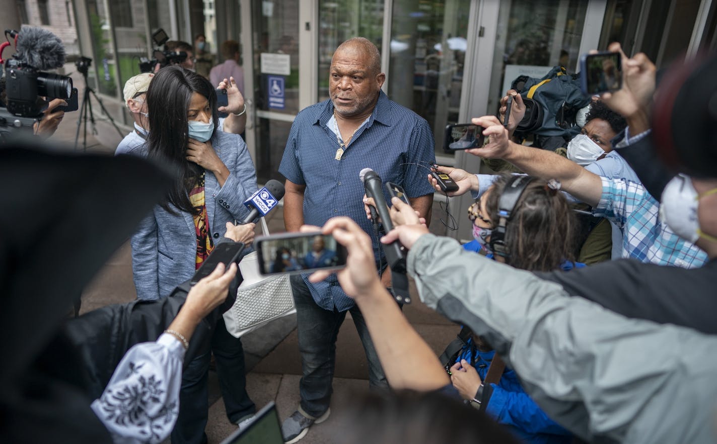 George Floyd aunt Angela Harrelson of Minneapolis left and his uncle Selwyn Jones of Gettysburg, South Dakota spoke to the members of the media outside of the Hennepin County Public Safety Facility Monday morning .