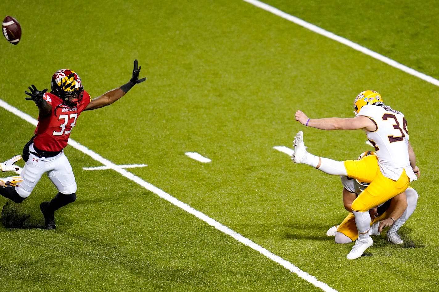 Gophers place kicker Brock Walker misses an extra point during overtime against Maryland