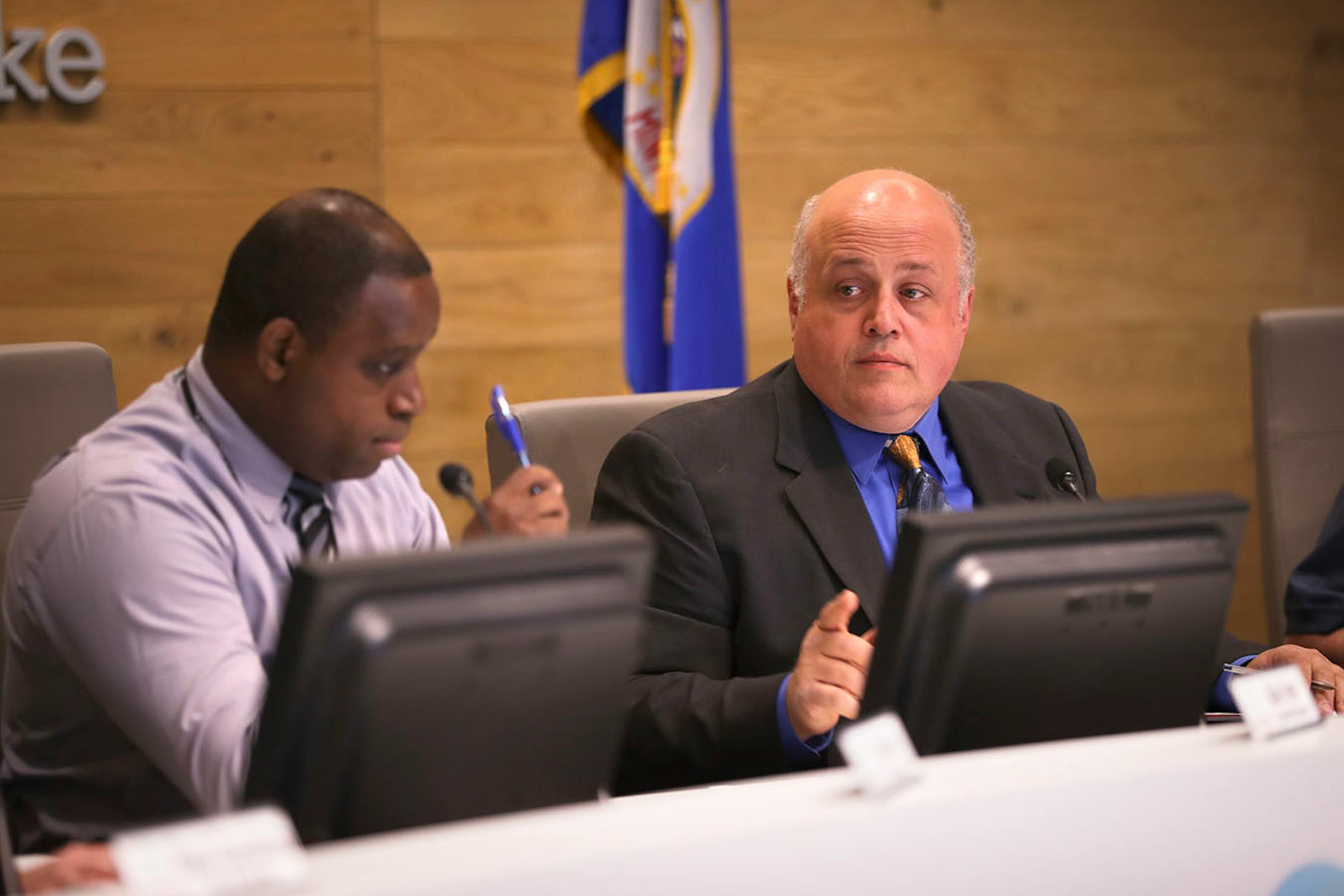 Forest Lake Mayor Ben Winnick and Council Member Mike Freer, left, as the council sorted out motions to reverse their decision from last week.