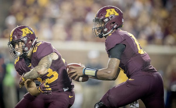 Shannon Brooks, left, and Demry Croft were part of a methodical, but perhaps somewhat boring, Minnesota offense on Thursday. That less-than-thrilling 